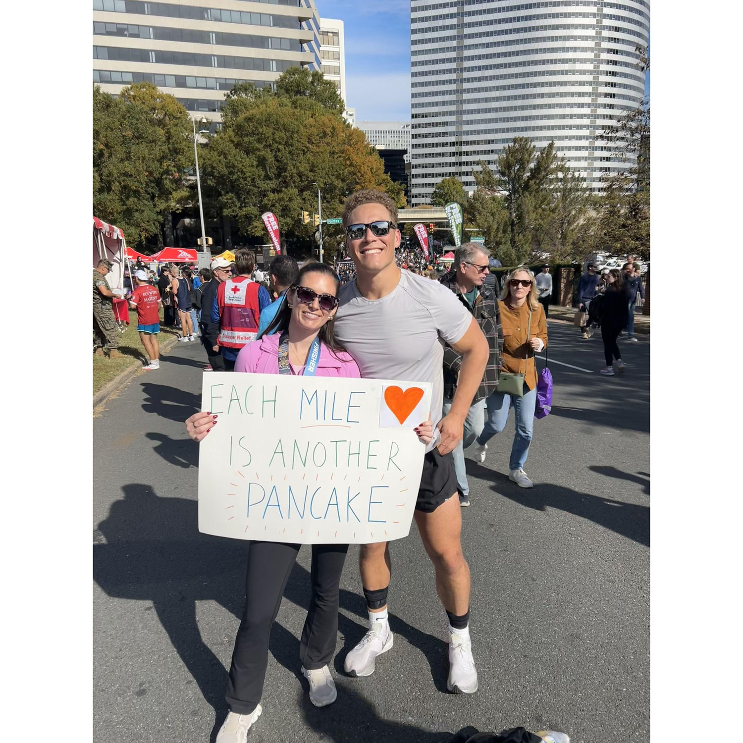 Kyle running the DC marathon! Allison braved freezing temperatures to watch him cross the finish line, which is why she is wearing the medal.