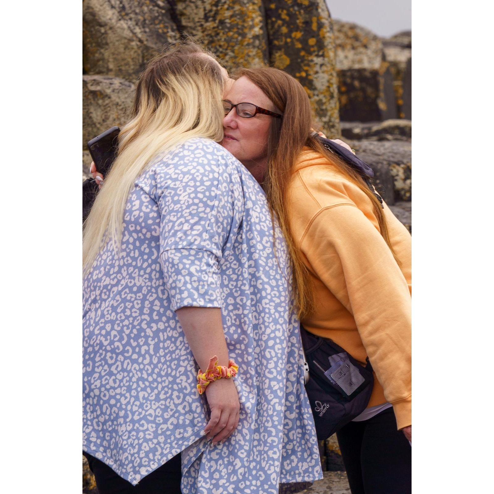 A congratulatory hug on our engagement from mom.