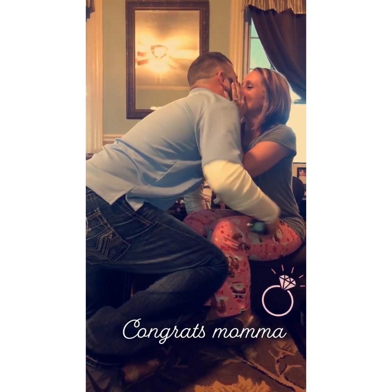 The kiss after the proposal on Christmas morning.