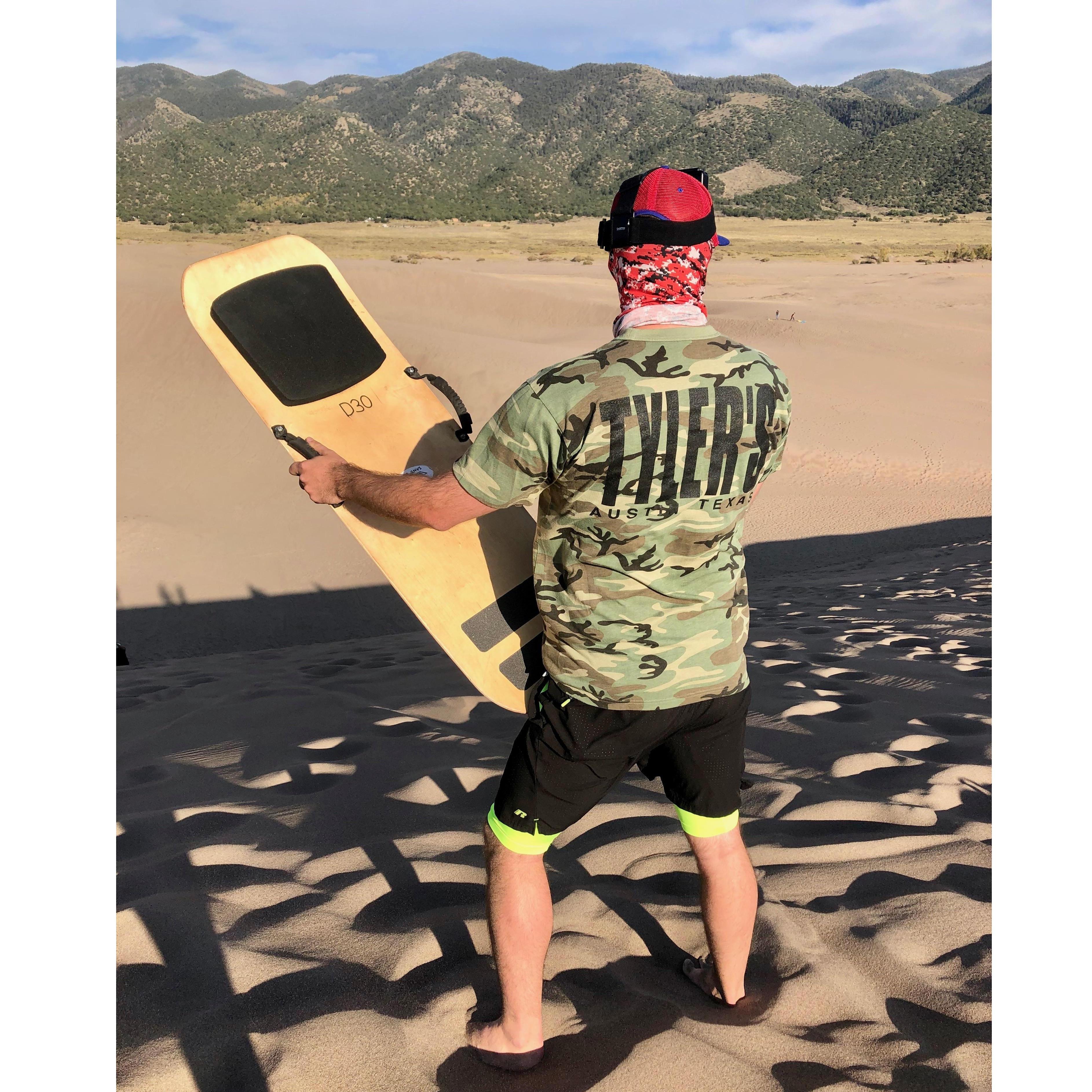 About to soar down the sand dunes