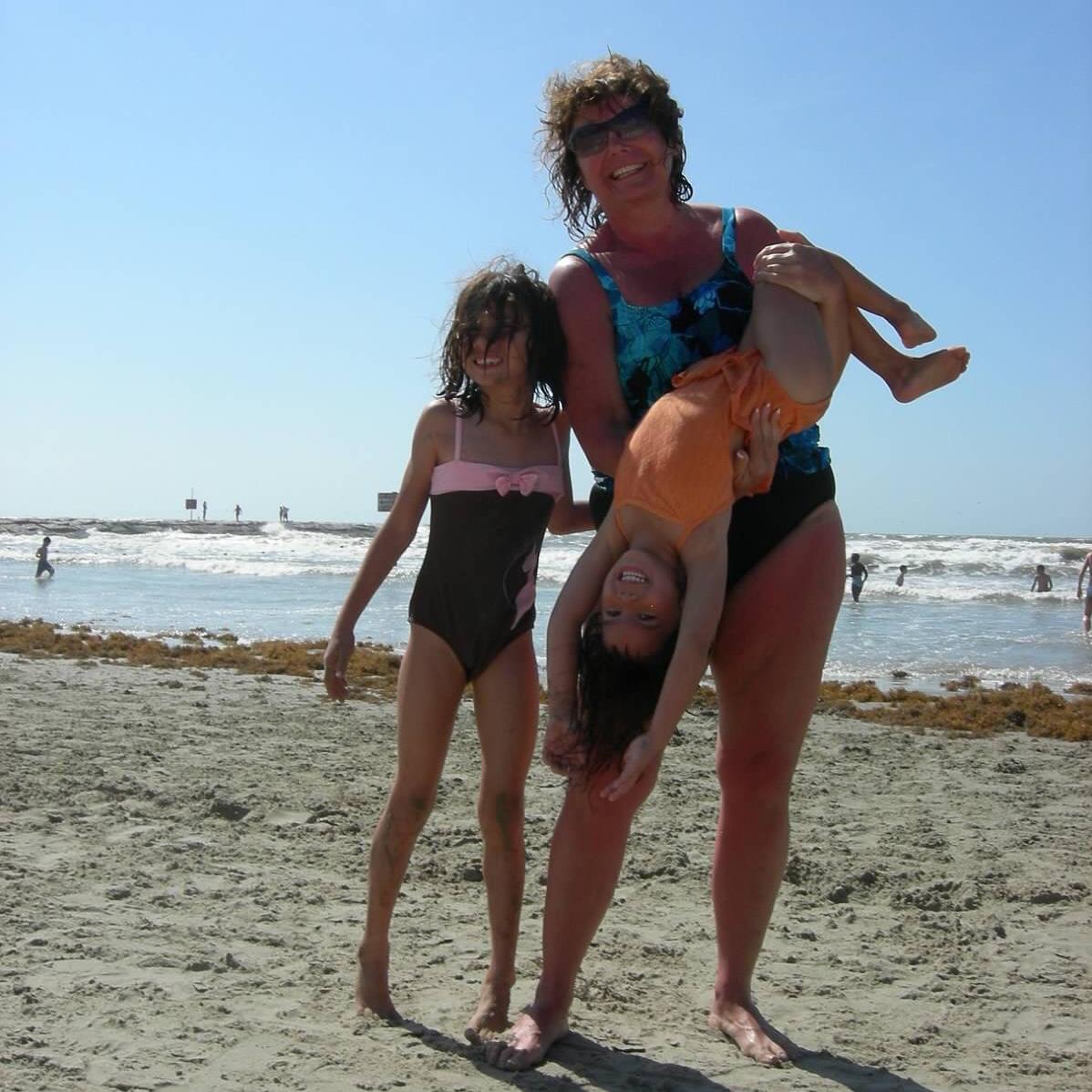 The bride and the bridesmaids. 
l to r - Lexie, Kathy and an upside down Meredith - Galveston Beach, TX - Summer 2006