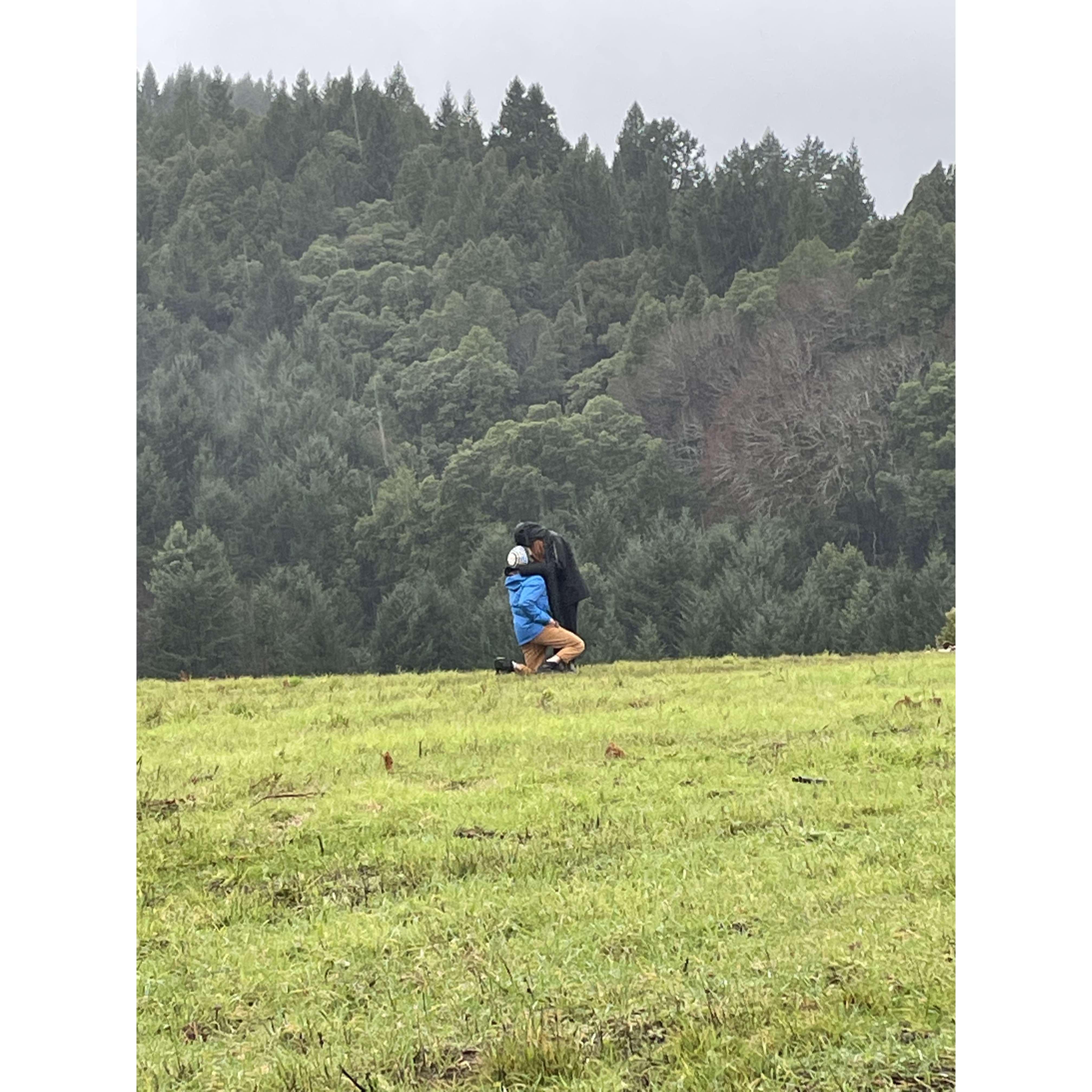 Surprising Rachel on the top of the hill in Whitethorn on December 26th, 2021. On the exact spot we'll be having our ceremony! Rain was falling (maybe a little hail too) when she said yes!!