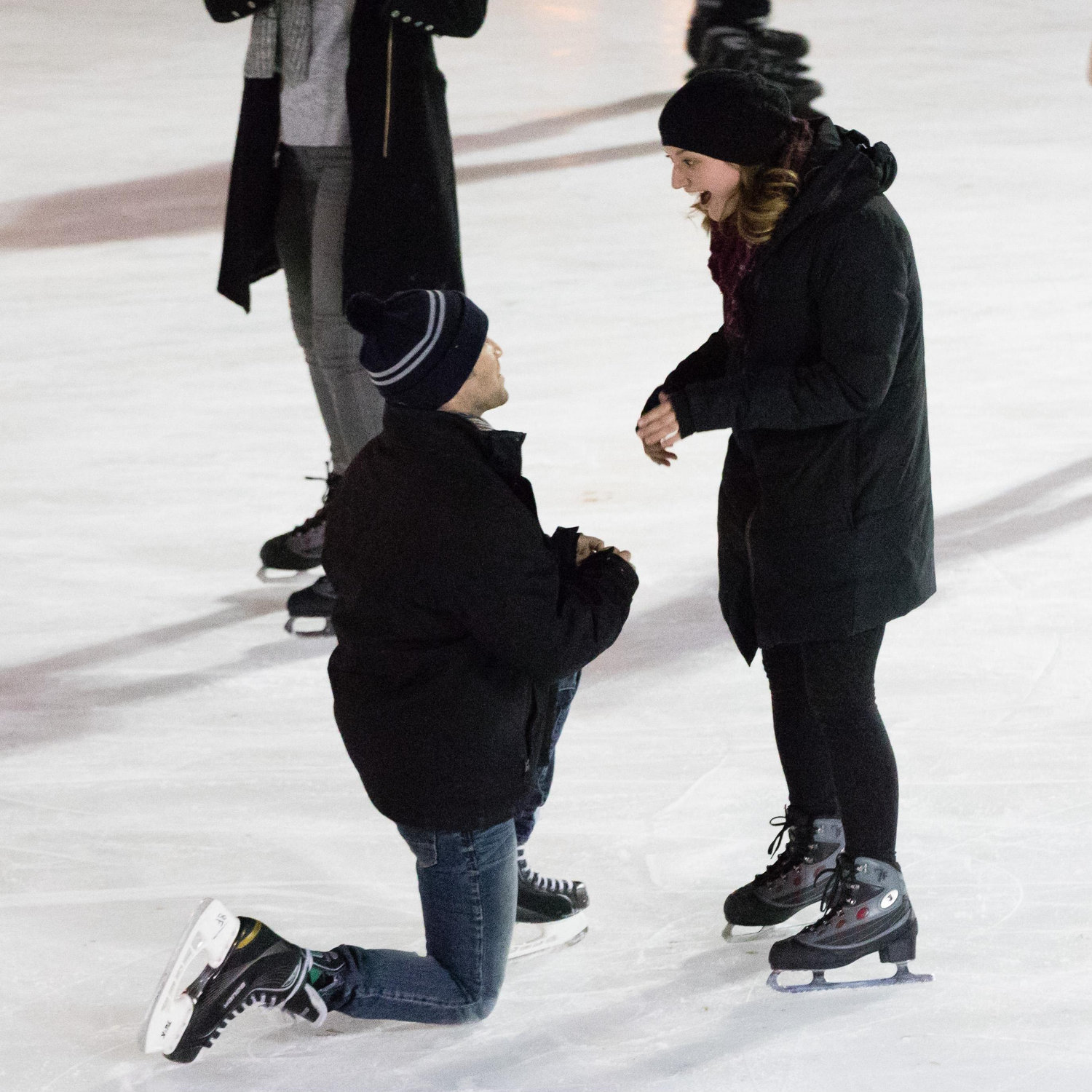 ...realizing this is real as he gets down on one knee.