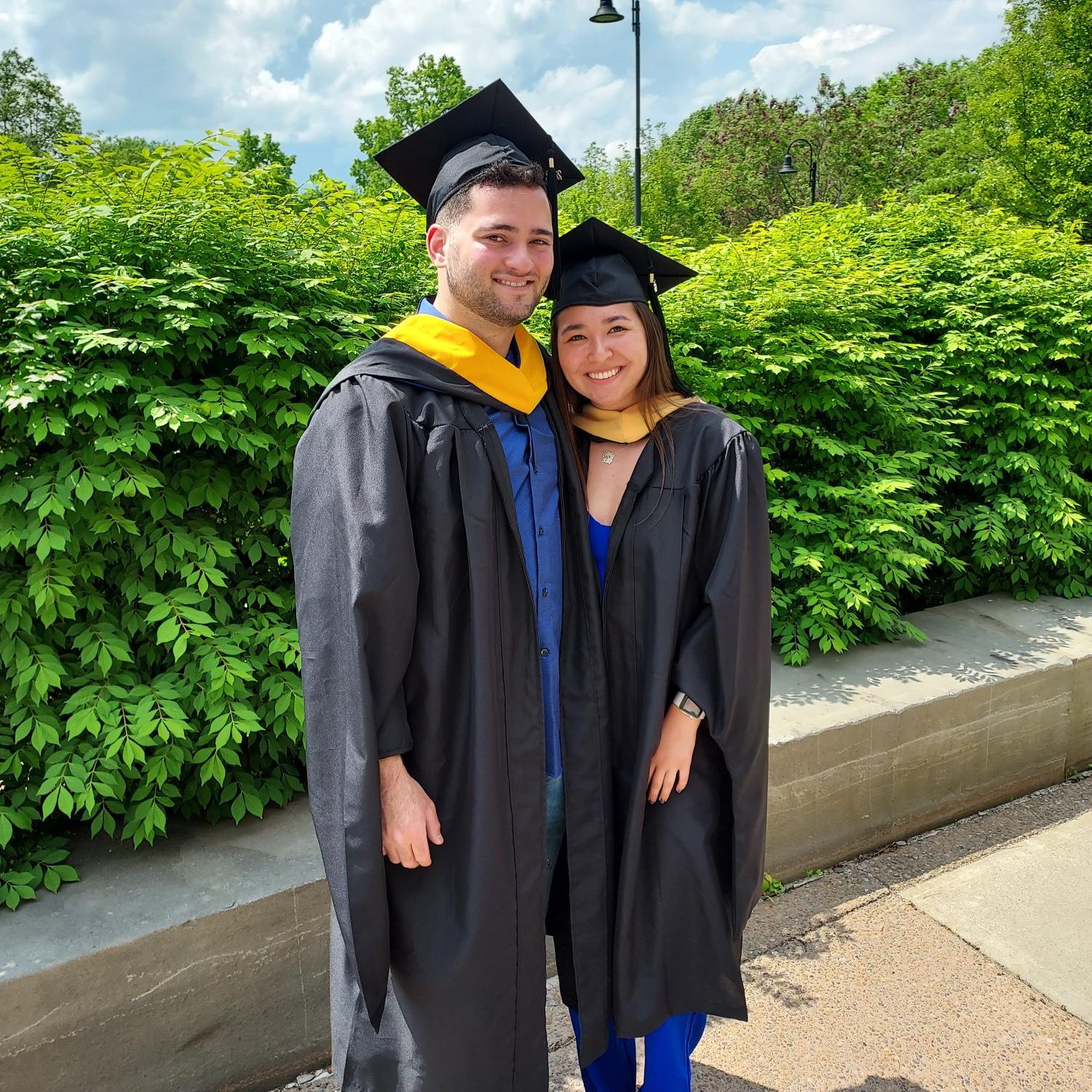 Celebrating our Master's in finding love at Binghamton University in May of 2022
