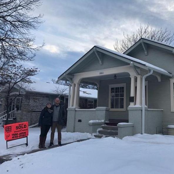 Moments after closing on our home! We couldn't have done it without the help of our families: moving us in during a snowstorm certainly added to the fun!