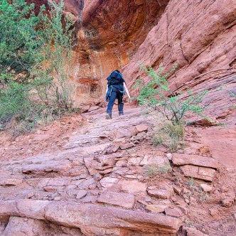 A photo of the short rocky scramble before the cave.