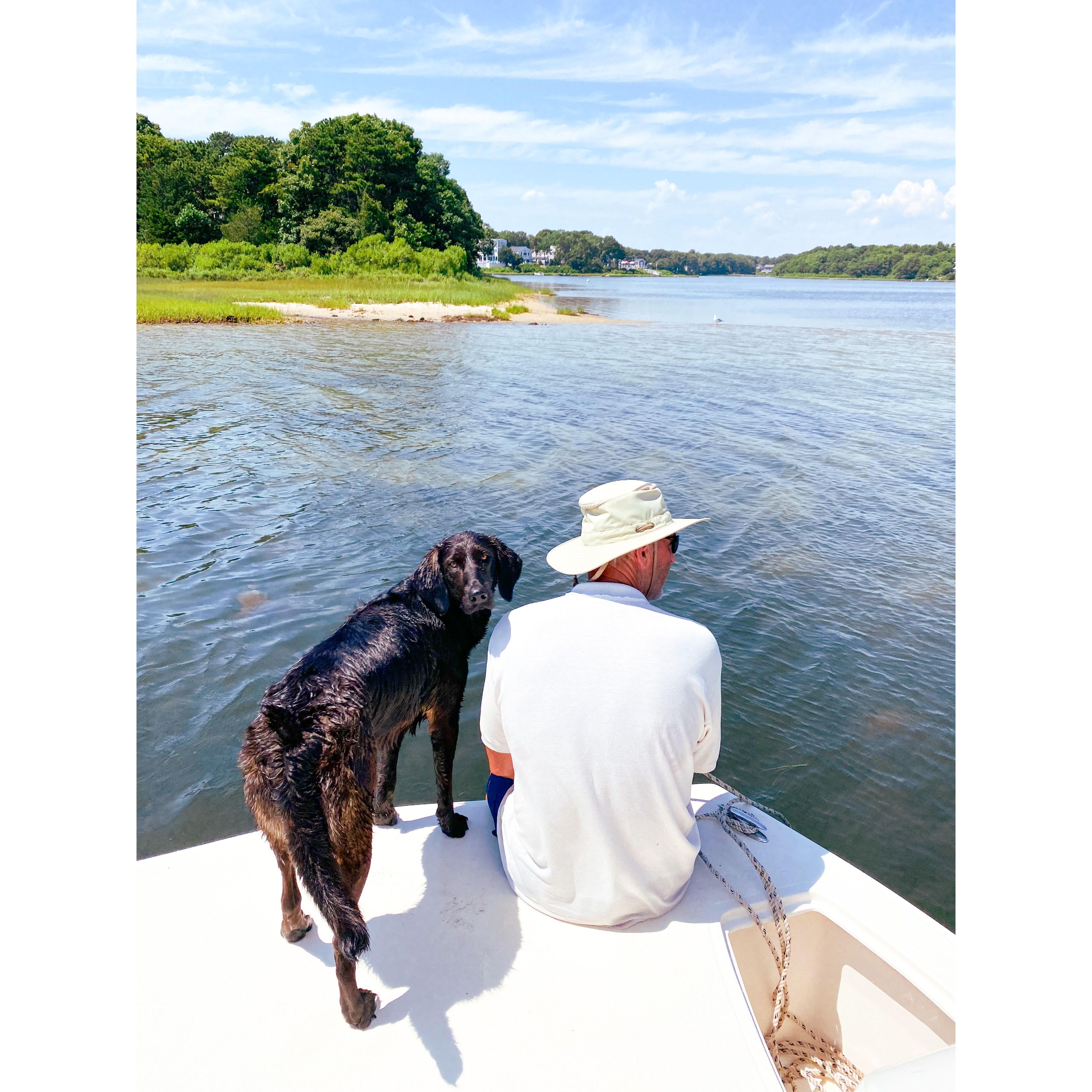 Doah and Mr. Brown doing both of their favorite summertime activity; riding the pontoon boat!
