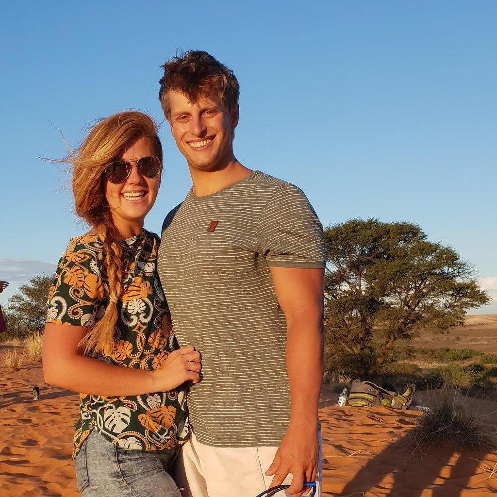 This picture was taken on New Year 2019 at the Bostwana border, in between fieldwork, so our families could see who we were dating. It's our first picture as a couple.