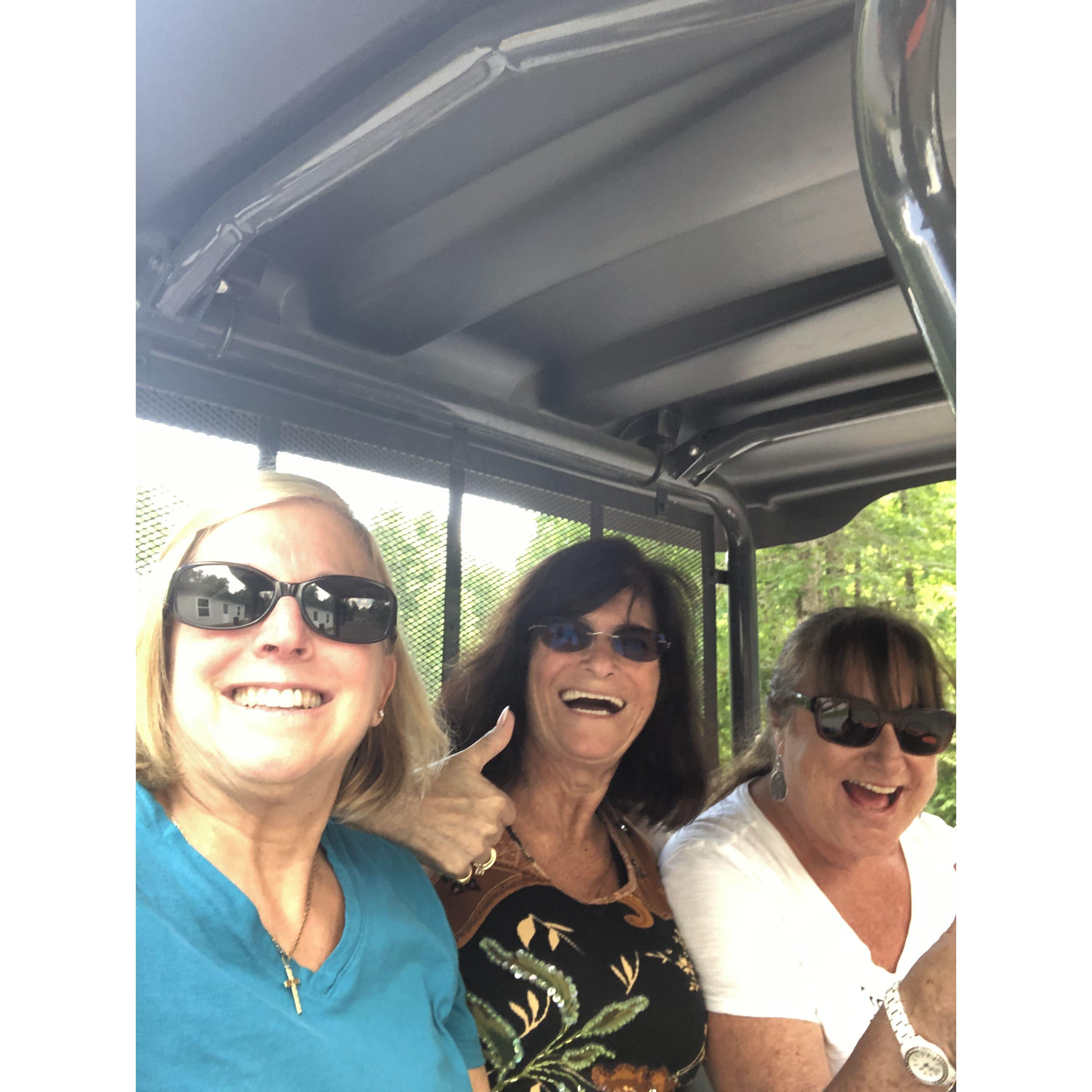 Judi enjoying her friends Lila & Kathleen on an ATV.