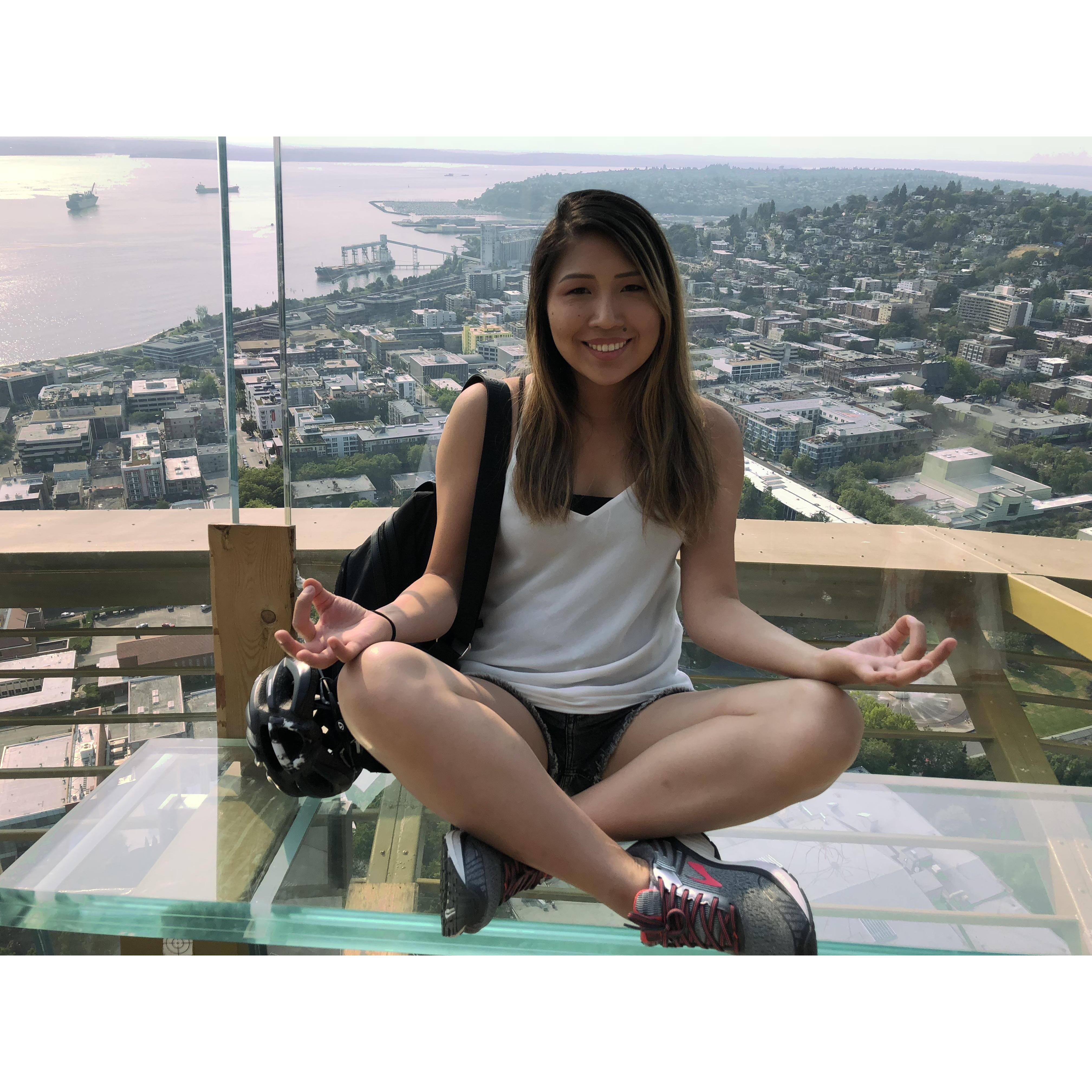Being playful at the top of the Seattle Space Needle before the big question!