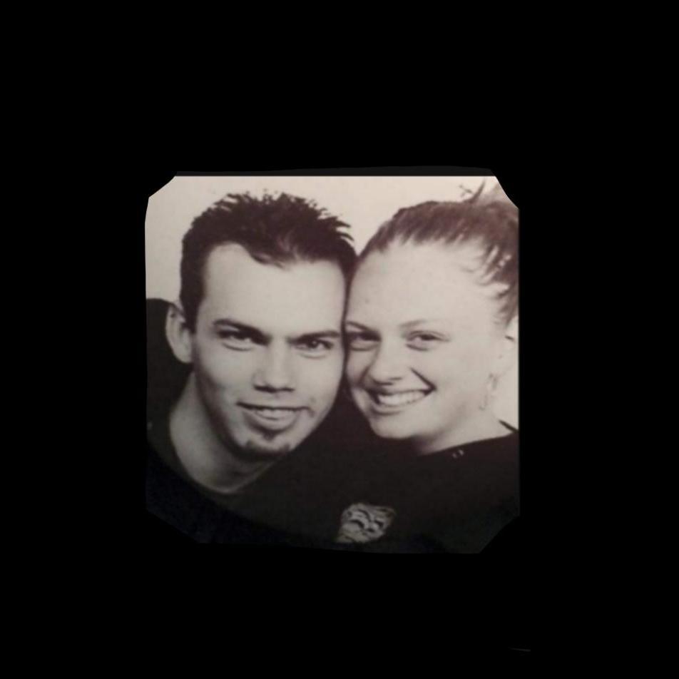 A million years ago (2005) while we were at the fair. We had just run into the button booth out of the rain. We were such babies!