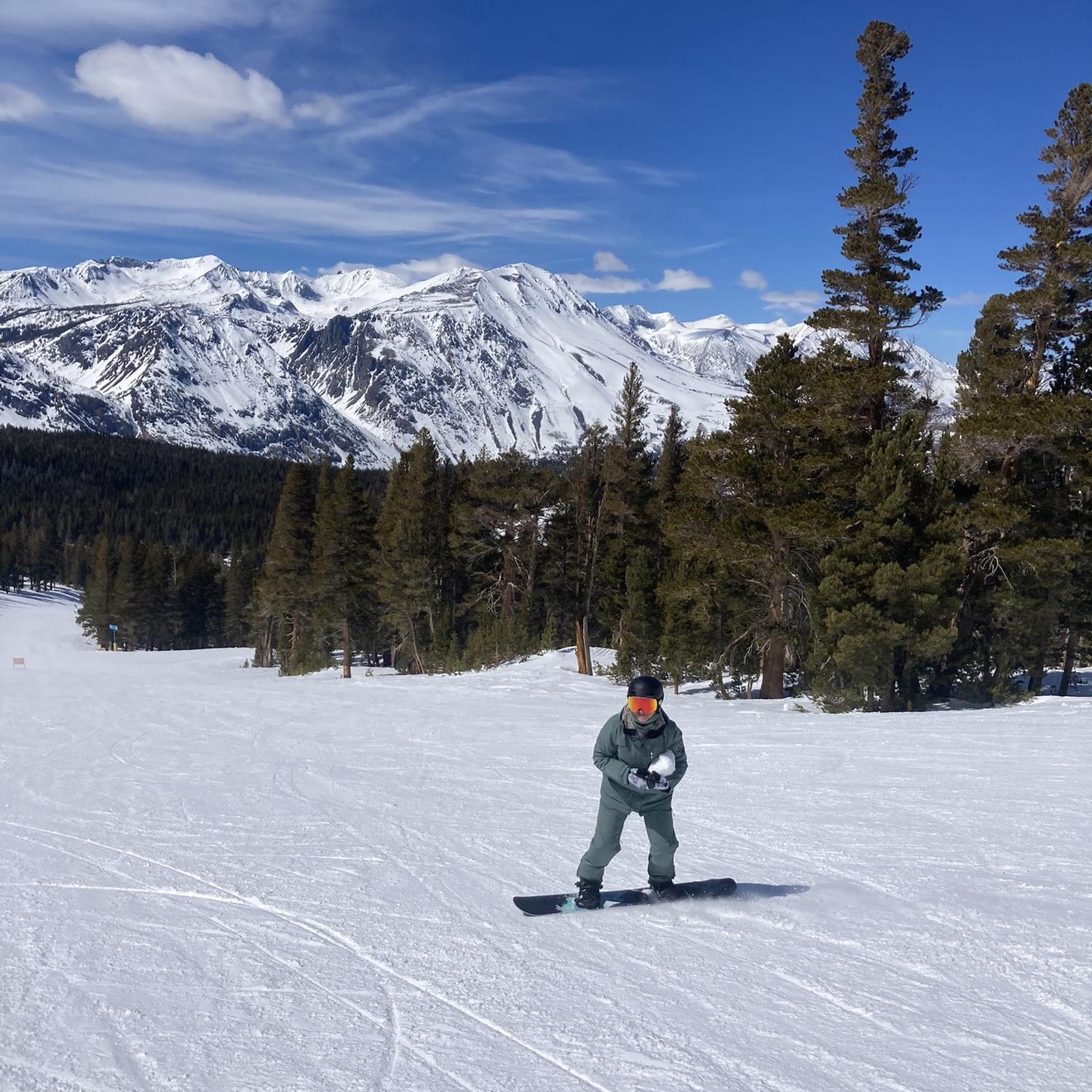 Lindsey riding with a small snowball