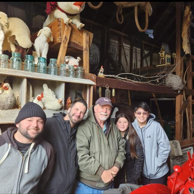 Dec. 18, 2022 - We visited Hersey Farm and saw many Hersey family artifacts. Pictured with us are Peter Hersey and Bill Hersey's children Emma and Billy.
Photo Credit: Bill Hersey