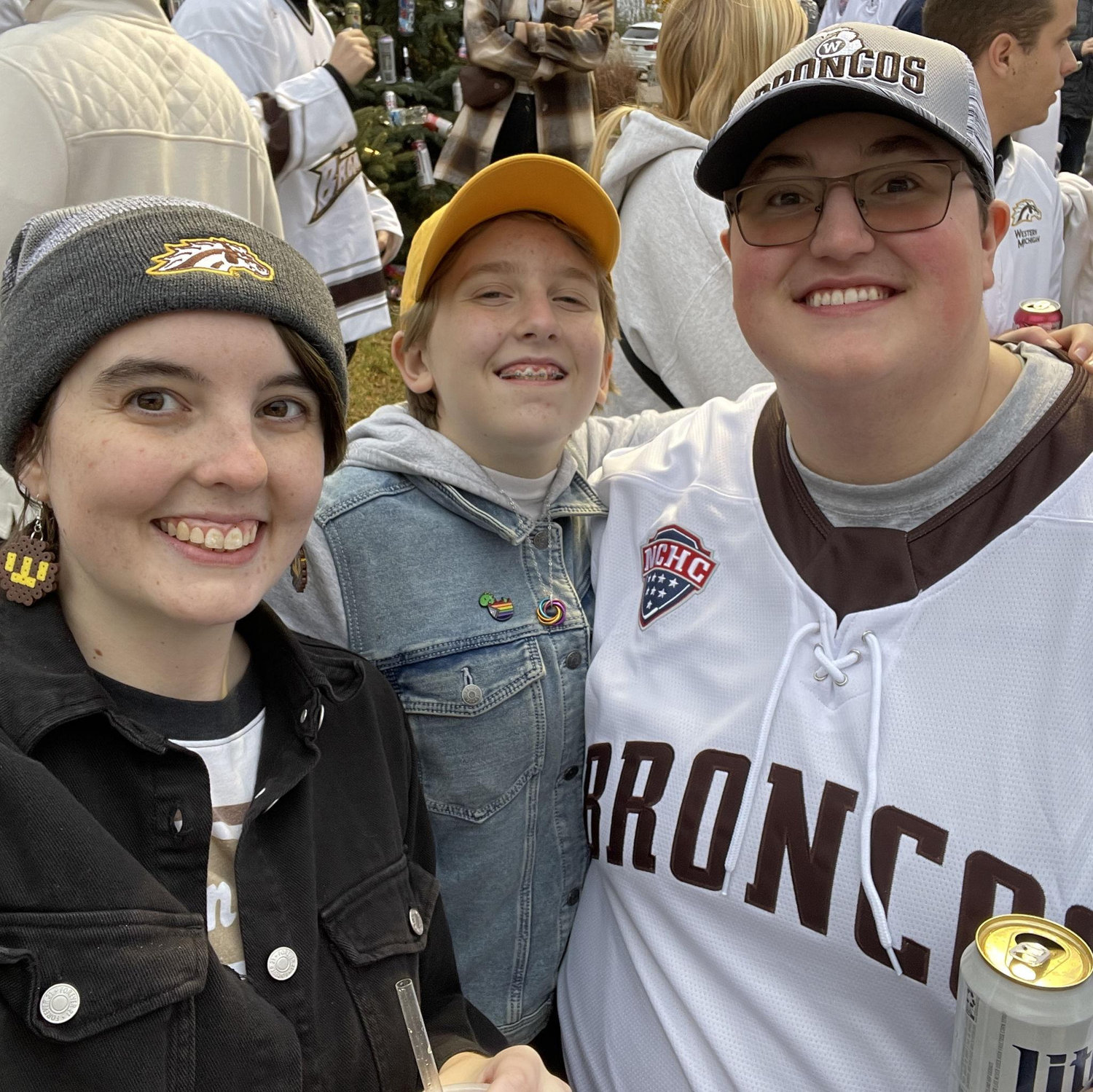 Lake, Sam, and Jay waiting in line for a Western Michigan Hockey game at Lawson Arena. November 2024.