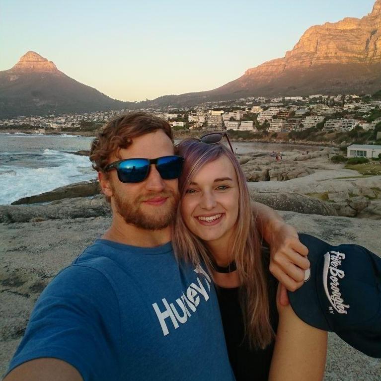 Sundowners on the infamous boulders of Camp's Bay.