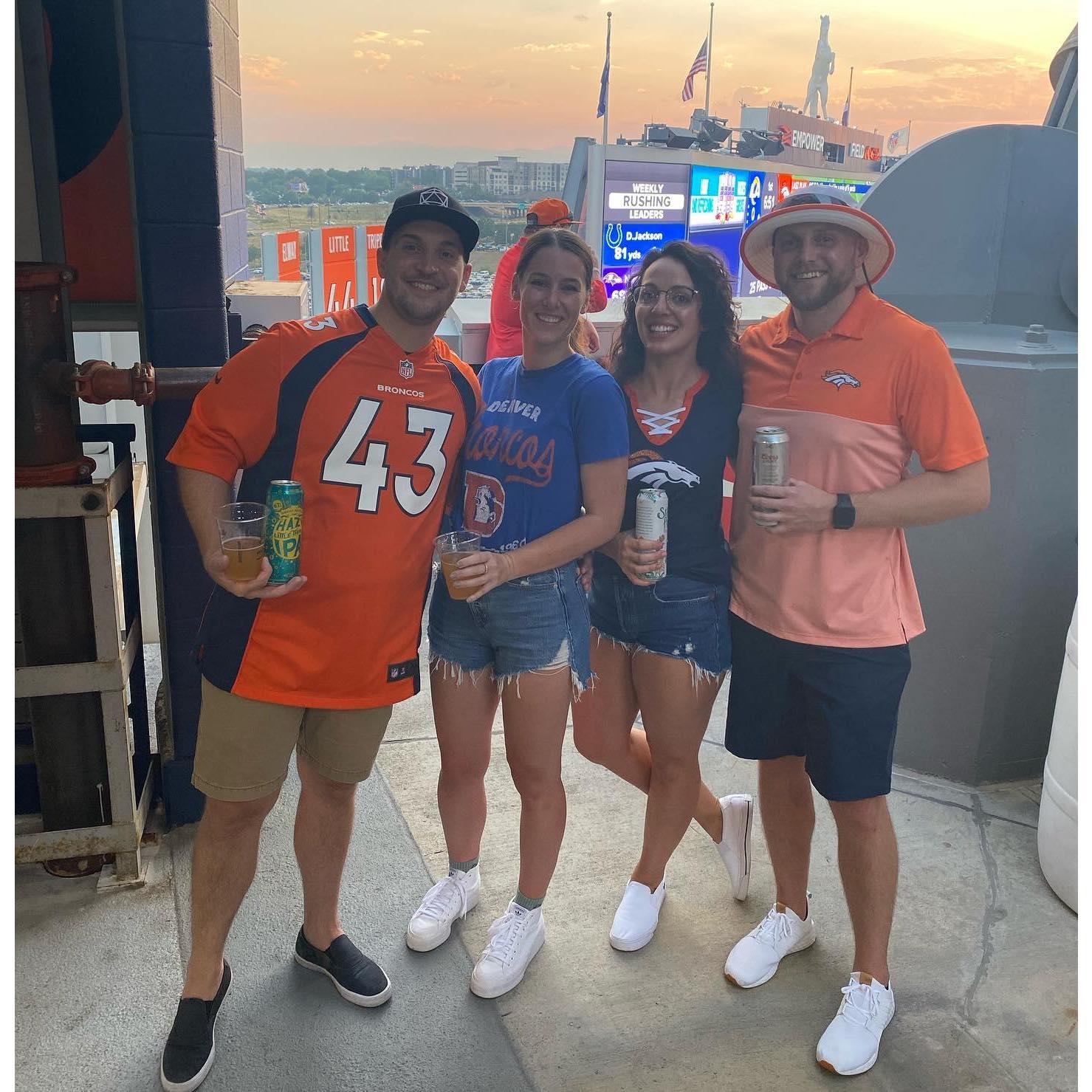 We spent a lot of our first dates together at Broncos games with friends, thanks to Craig and Traci Maier!