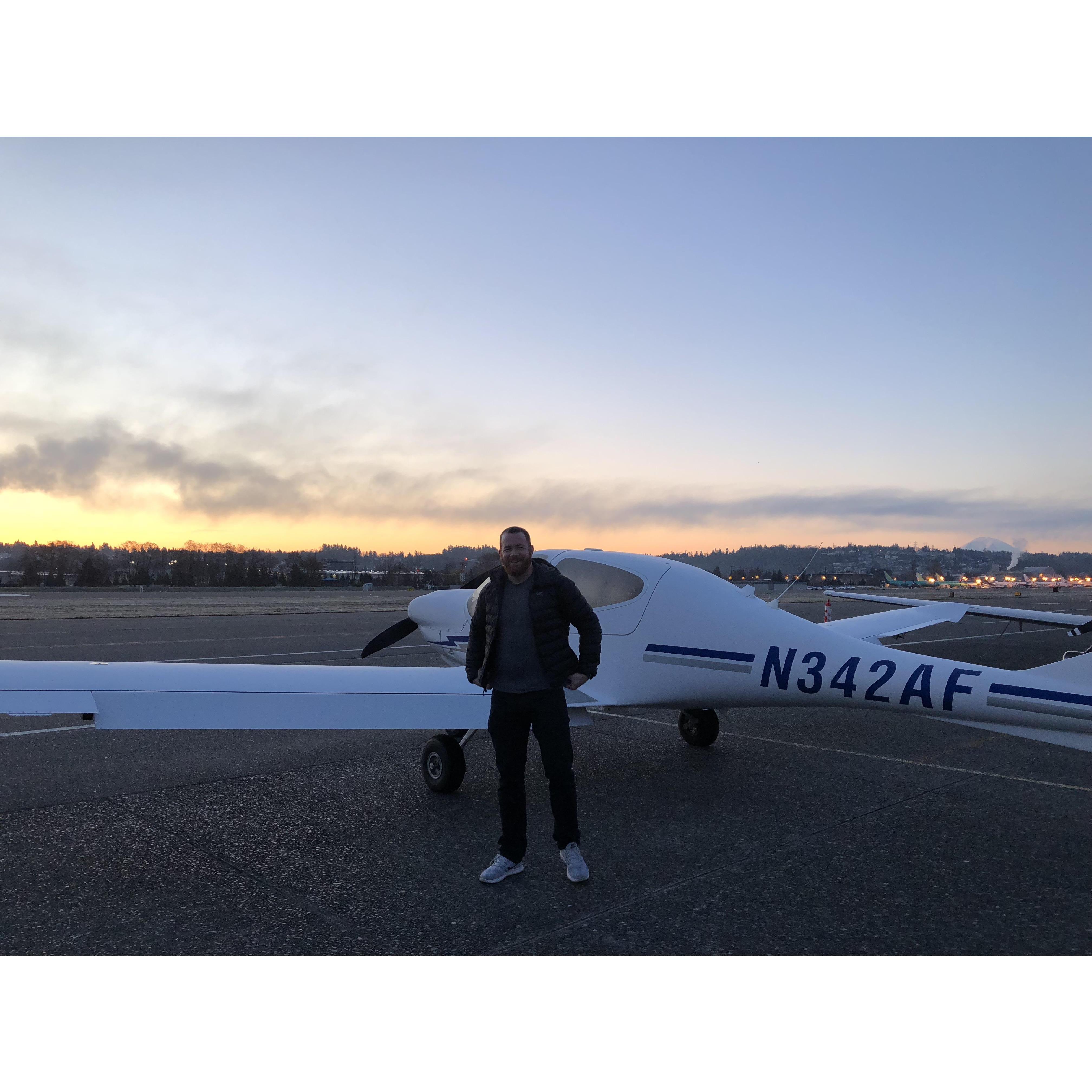 Jeremy watching the sunrise from the runway.
