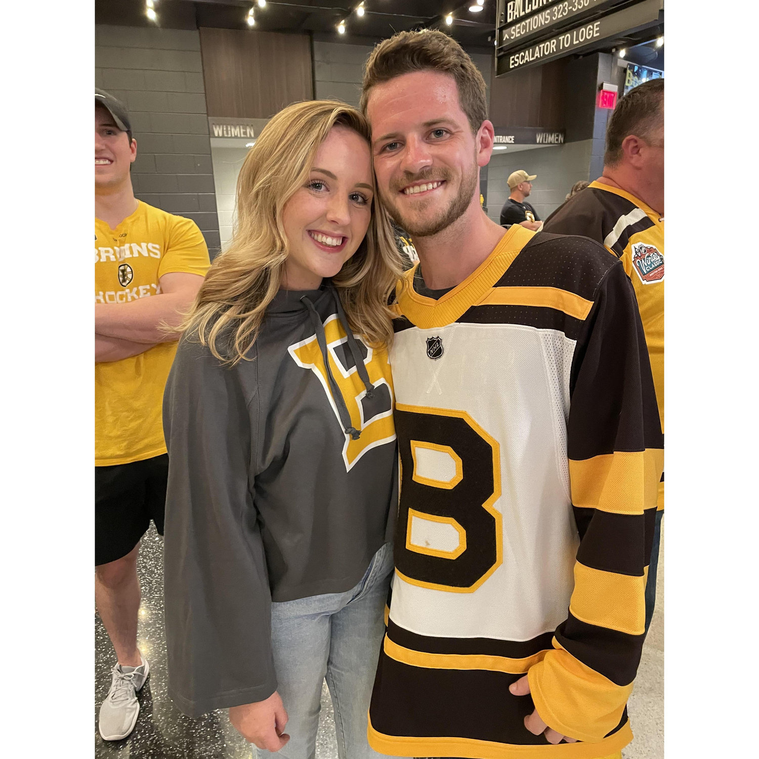 Us attending a Bruins Stanley Cup playoff game at the first game since the Covid protocols and mask mandate were lifted