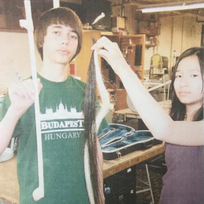 8th grade - Super excitedly posing for a picture while making the horse hair bow for Sounds of Music
