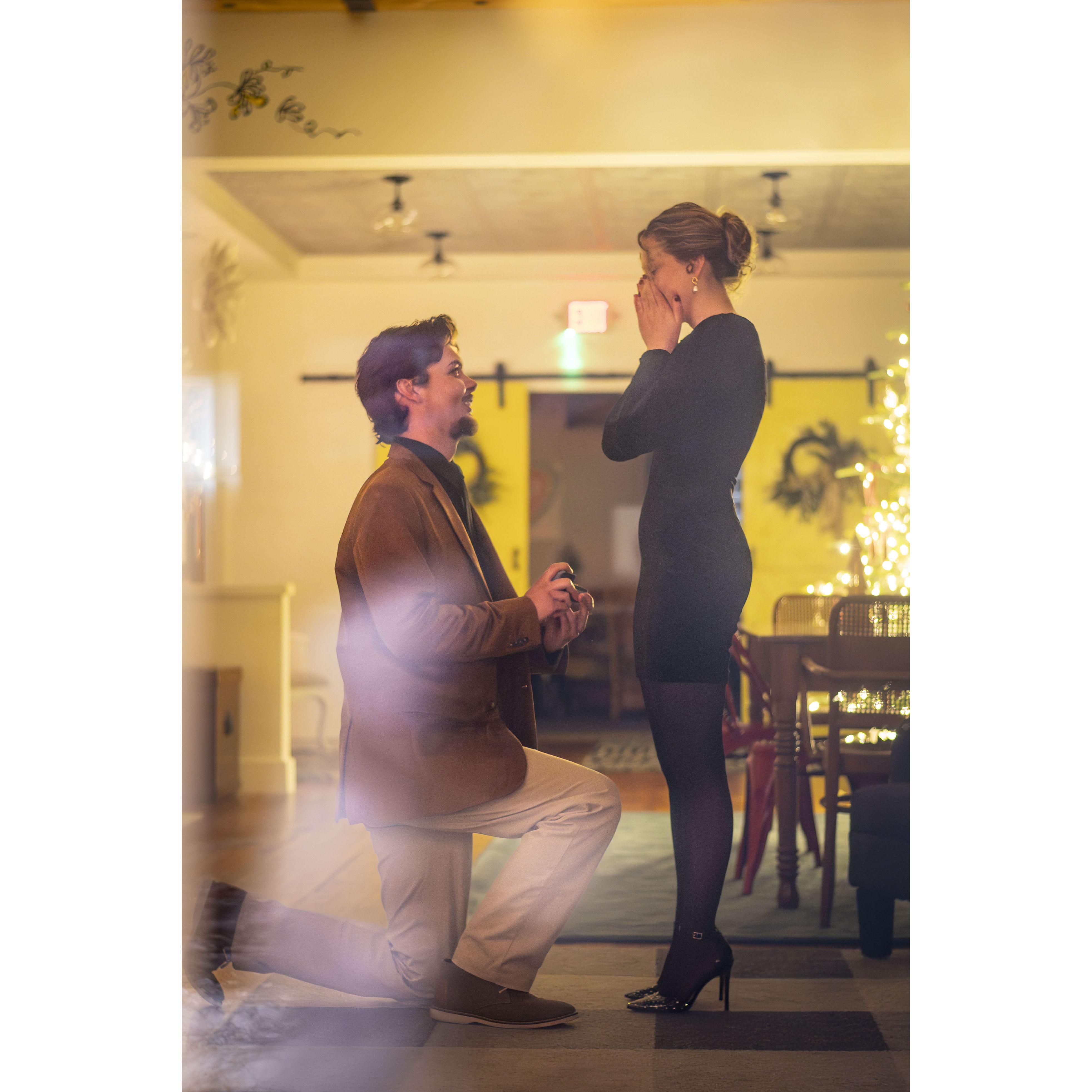 These photos were taken on 1/8/25 during our engagement! Our friend Gabe Diffanis hid outside a window to capture the moment, allowing us to keep it private. <3