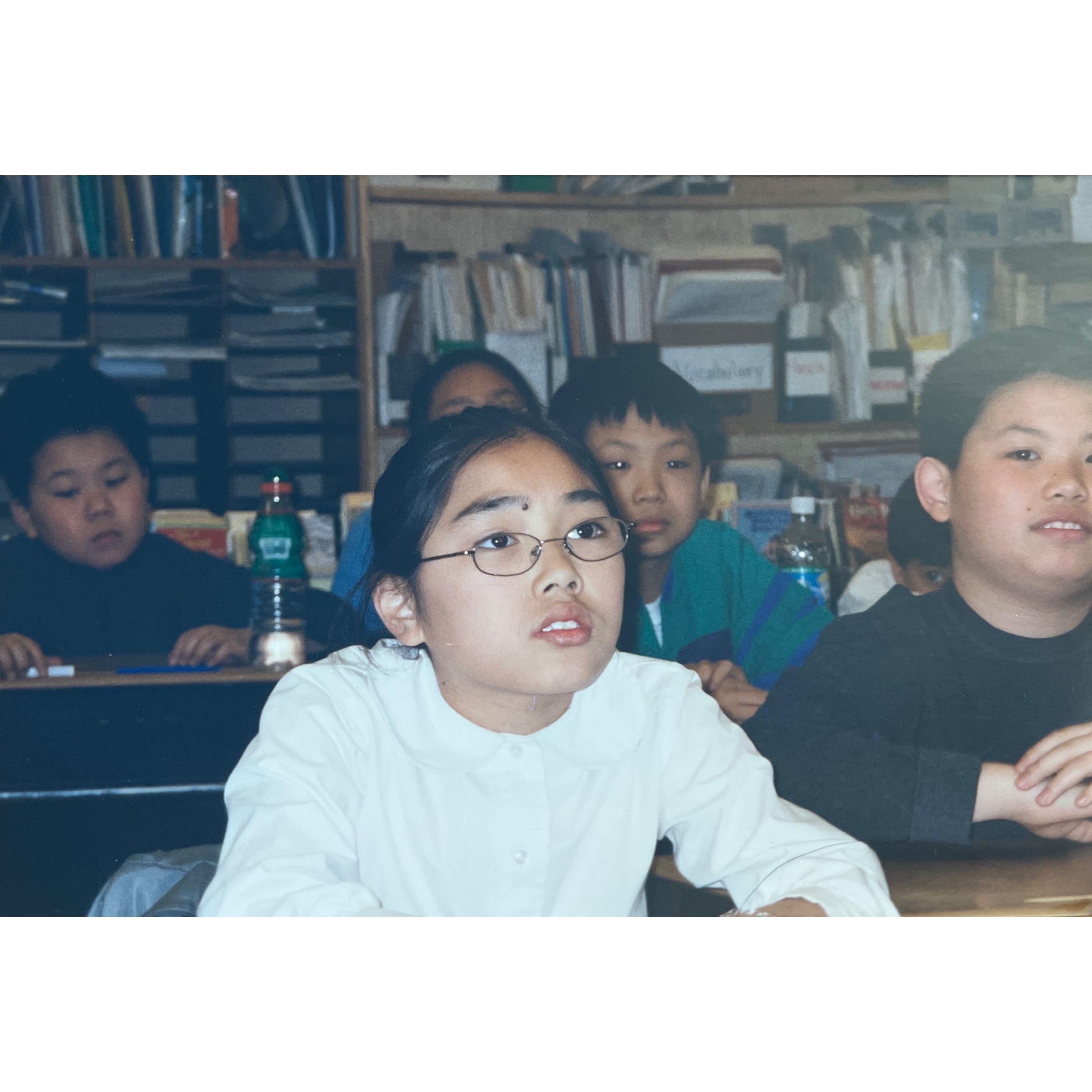 Our first photo together. Fun fact: We were teacher's pet and class clown. Who do you think was which?
