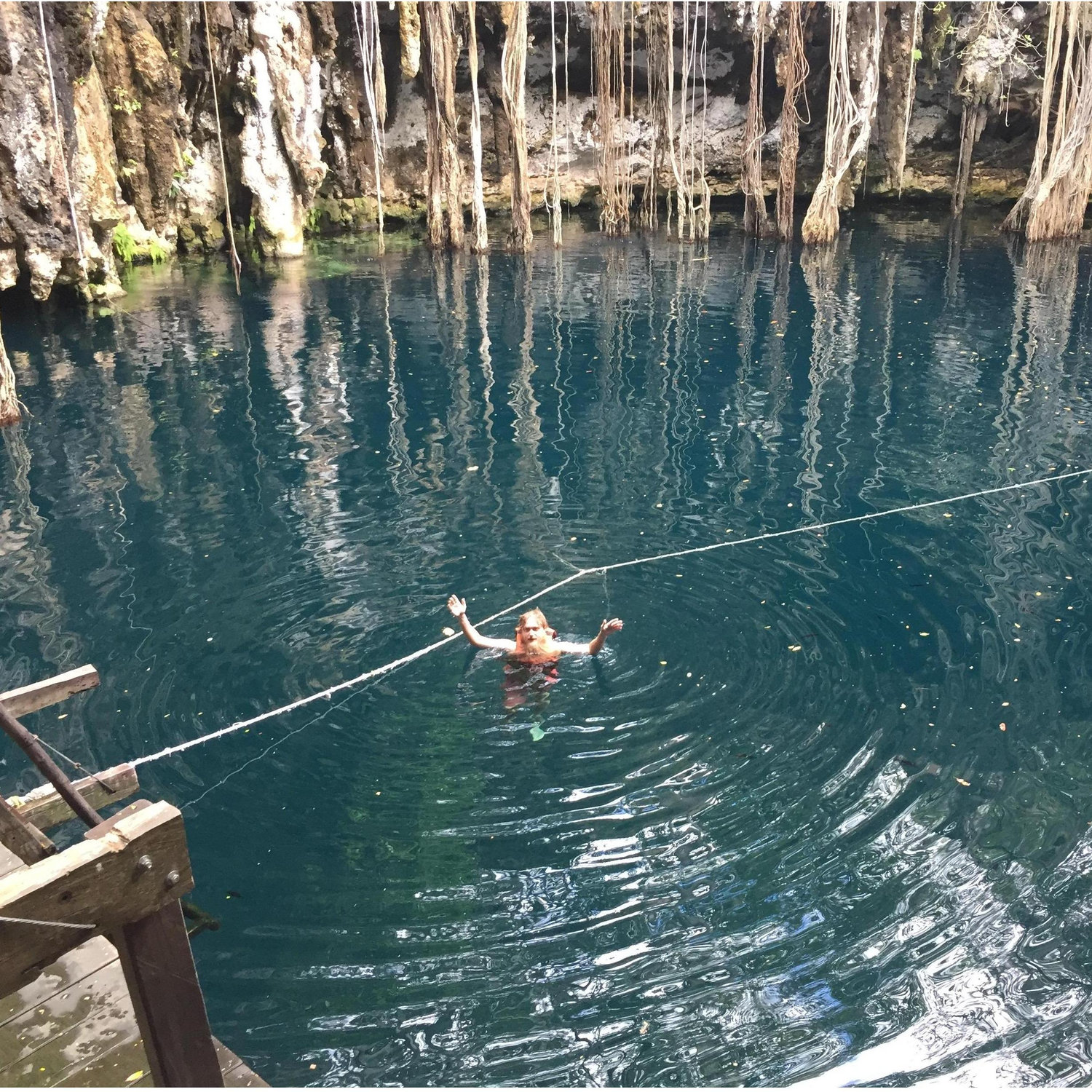 Charlie swimming in a cenote!