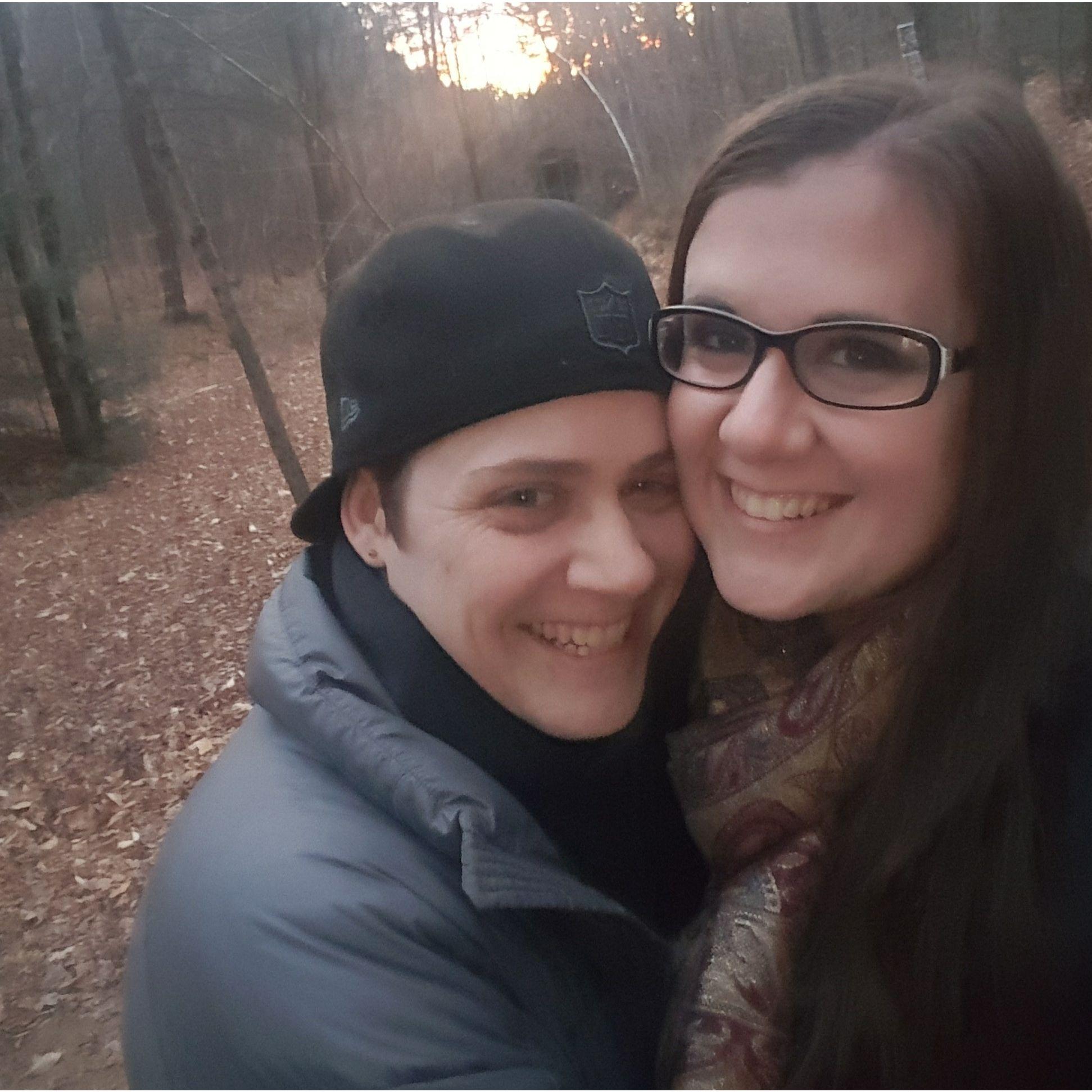 This was our first picture together. We were trying to chase the sunset while walking in the woods, which was also our first time going away together to VT.