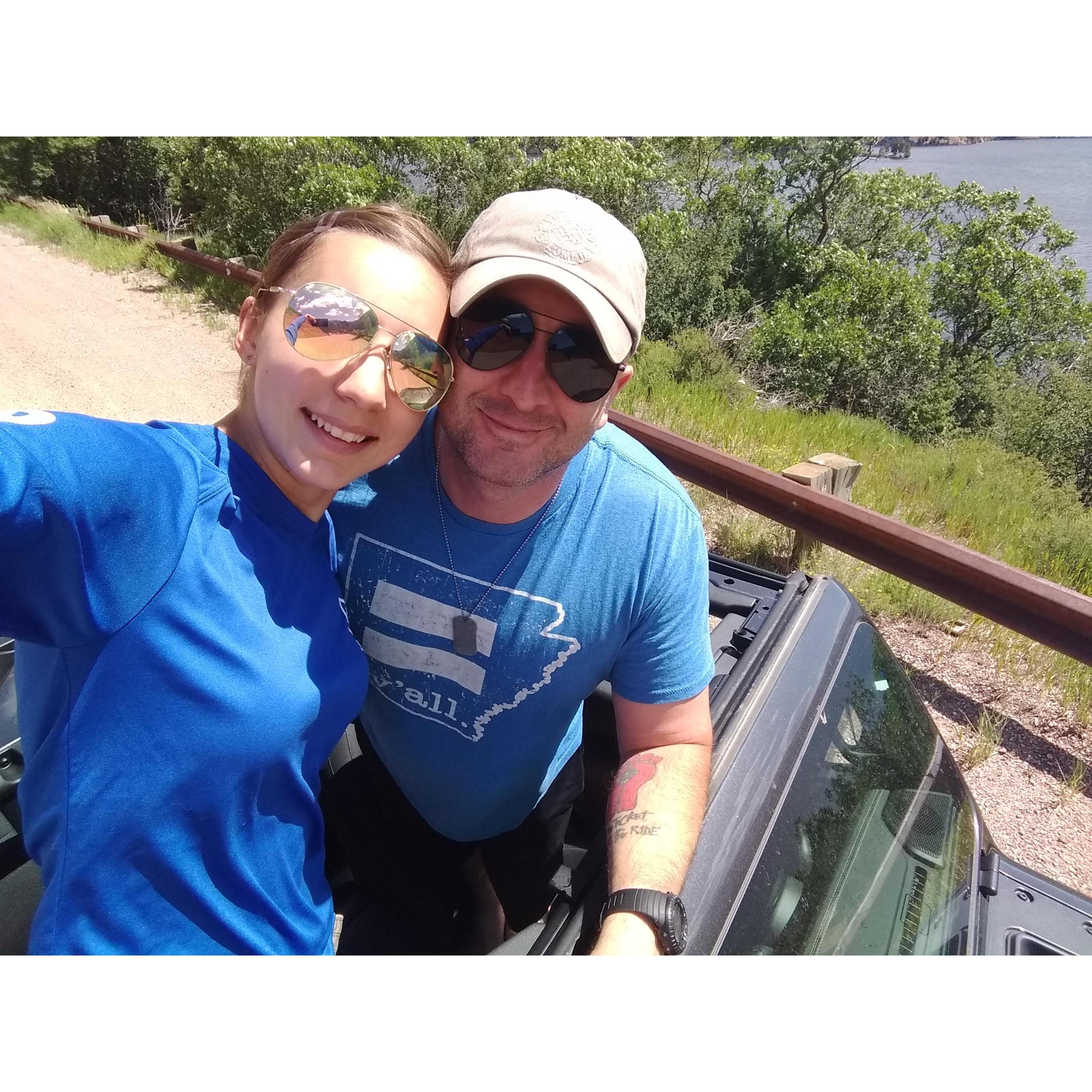 Taking the top off of the jeep.