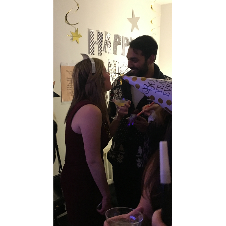 This is *the* moment Tom asked Laine to marry him. Notice the ring box in Tom's hand and Laine's mouth wide open. Best New Year's Eve ever, best surprise ever!!