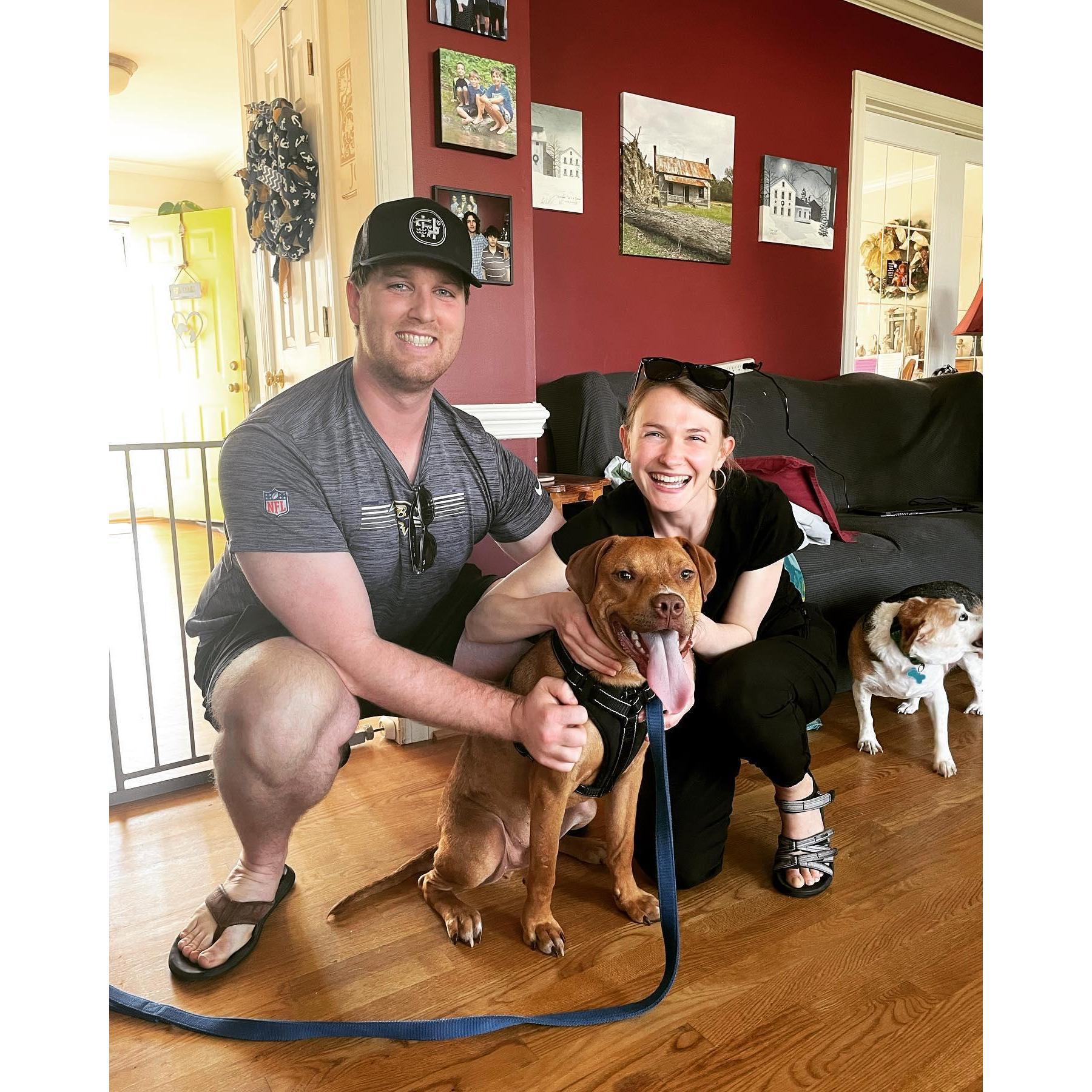 Craig and Rachel the day they adoped George at George's foster mom's house (he was a rescue pup!)