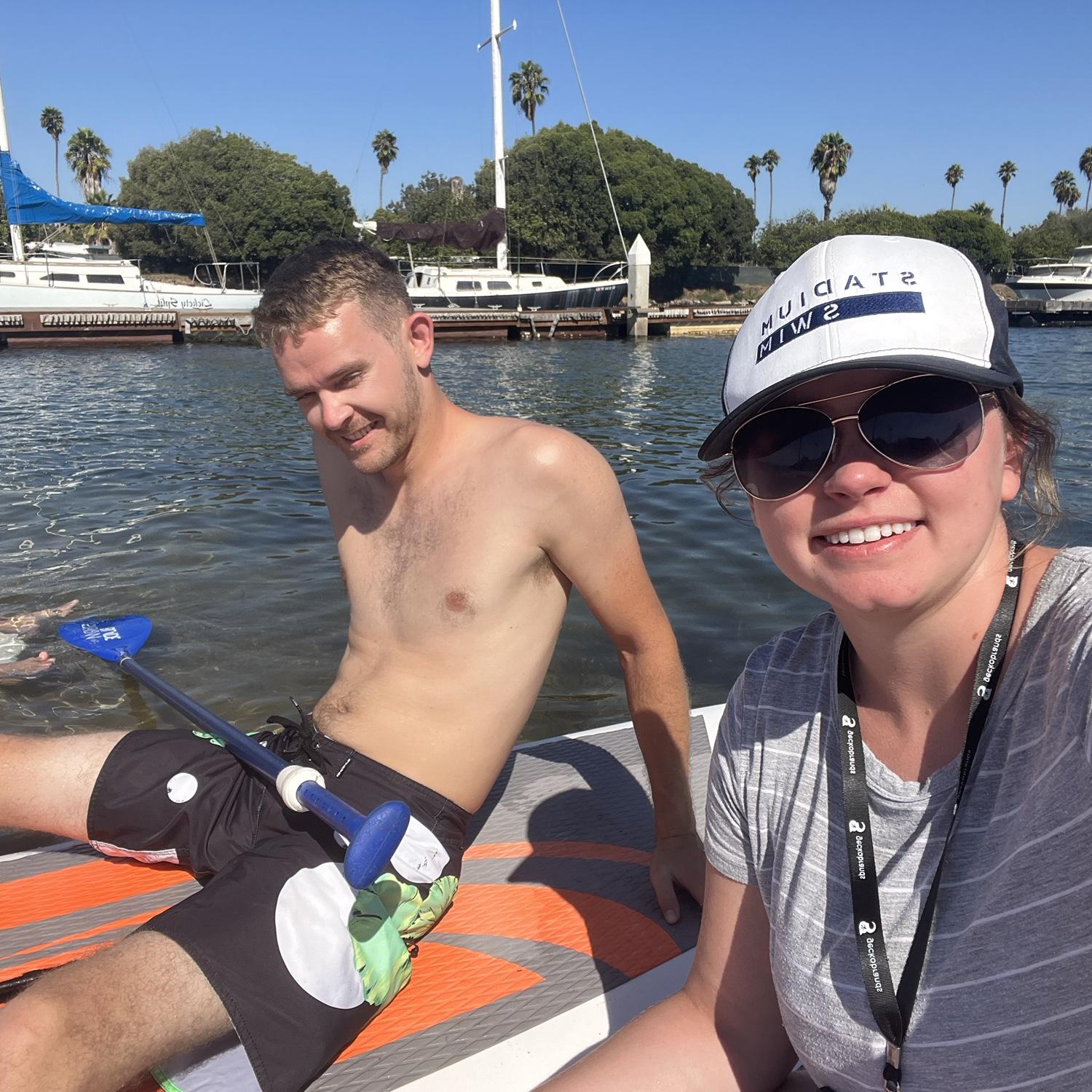 Paddle boarding together in San Diego.