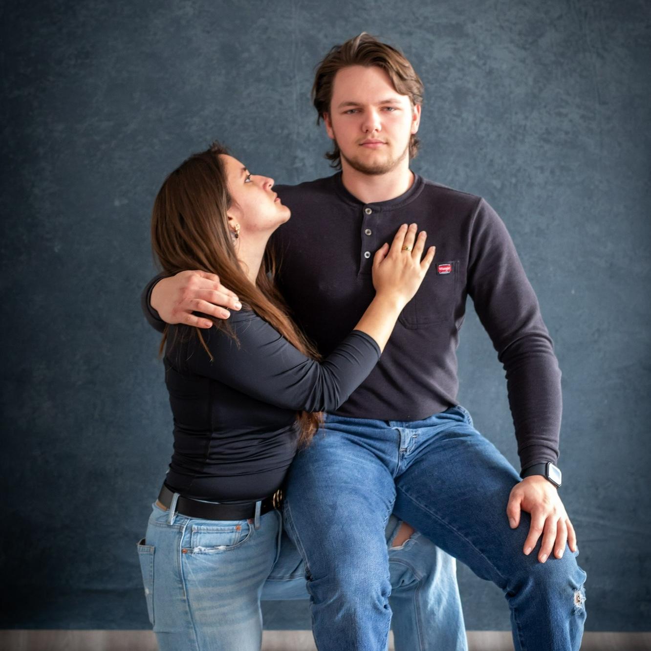 We surprised his mom with awkward JCPenney family photos. This was one of those pictures.