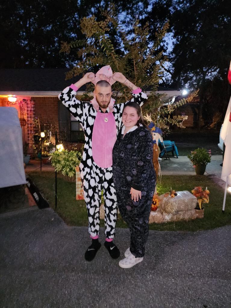 1st Halloween walking with our daughter, she was a dinosaur and 2 months old