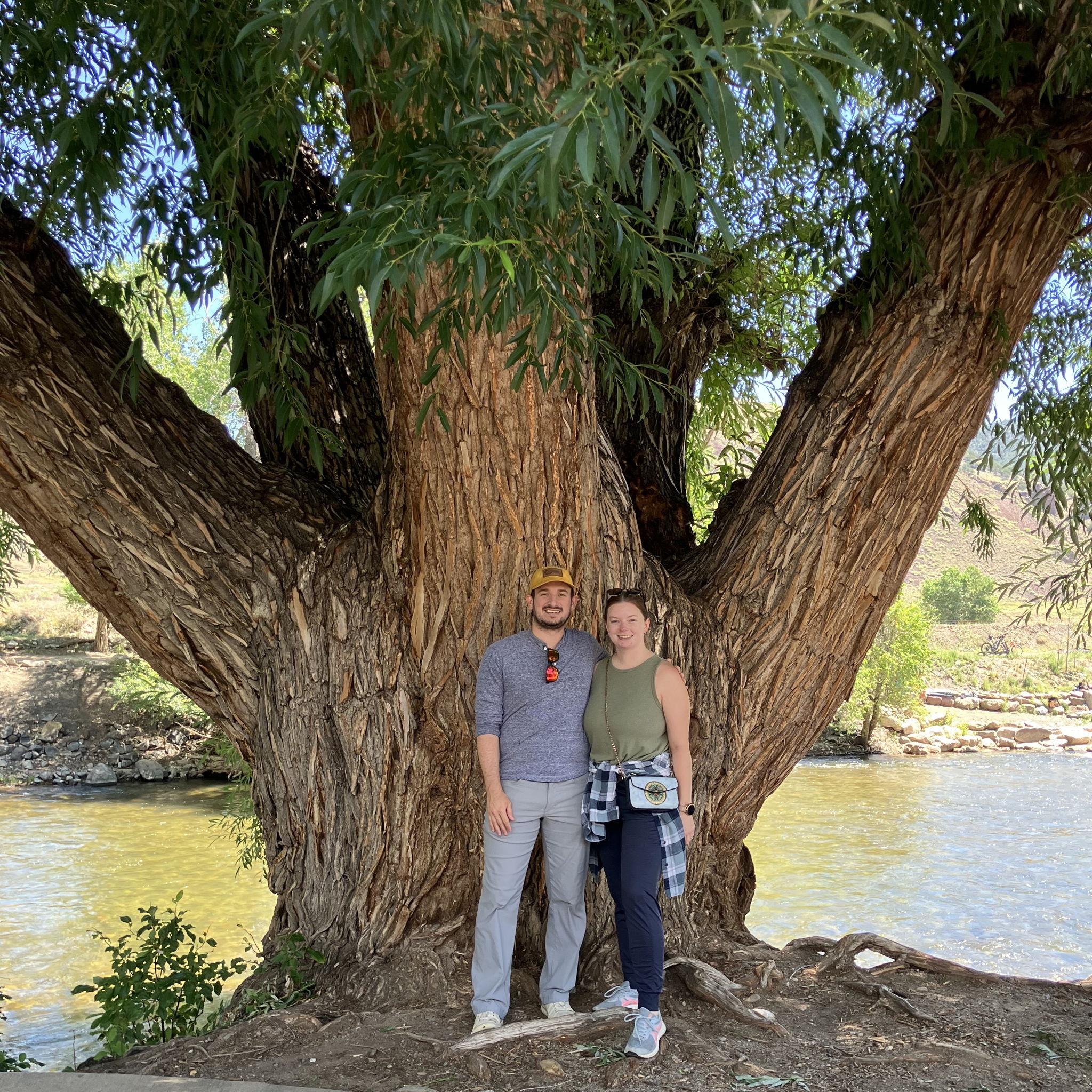 Visiting Clay and Beth in Colorado, posing with their favorite tree.