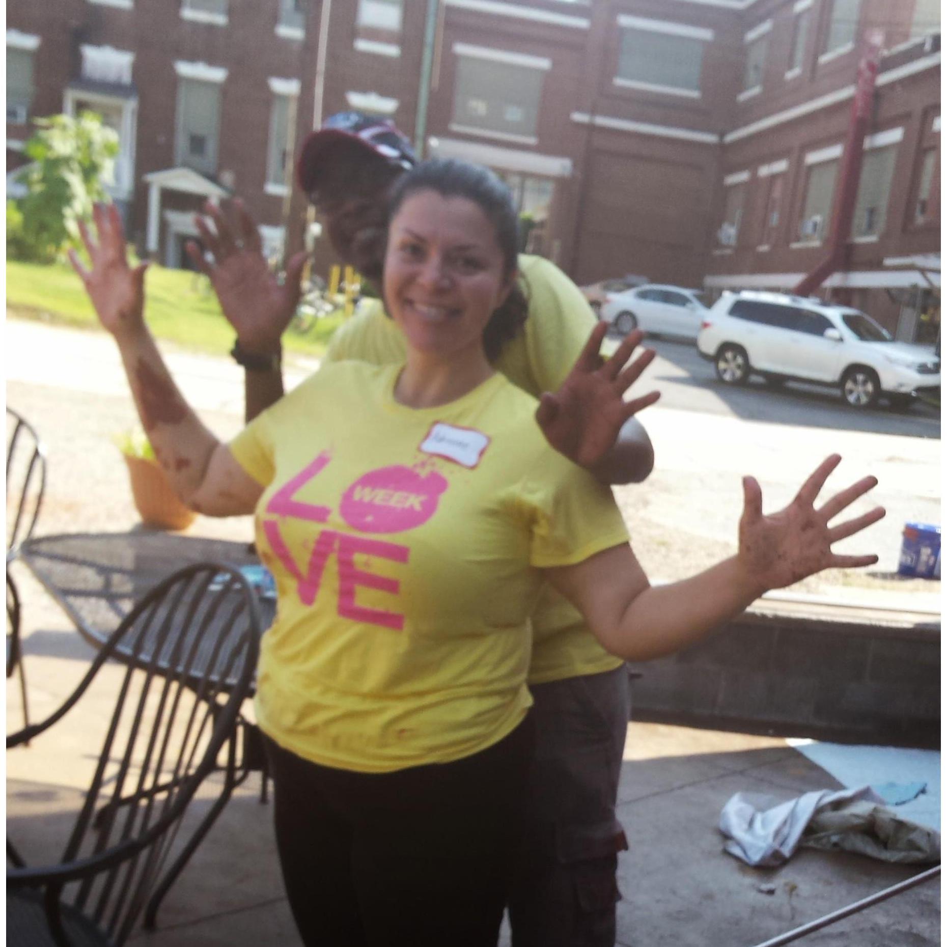 Getting to know Charlotte together included putting in some community service time, like on this day we painted a building.
