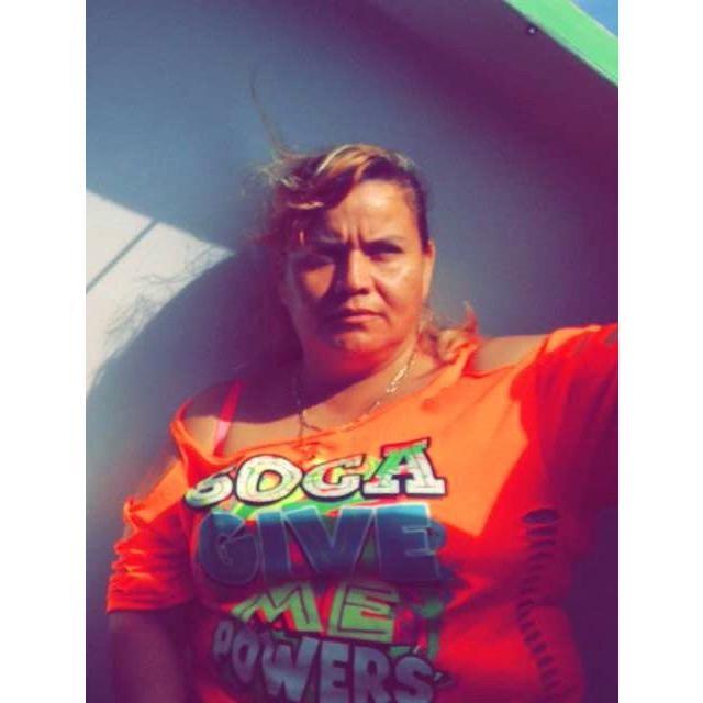 Ms. Sarah (Nellee's mother) enjoys a boat ride in Belize.