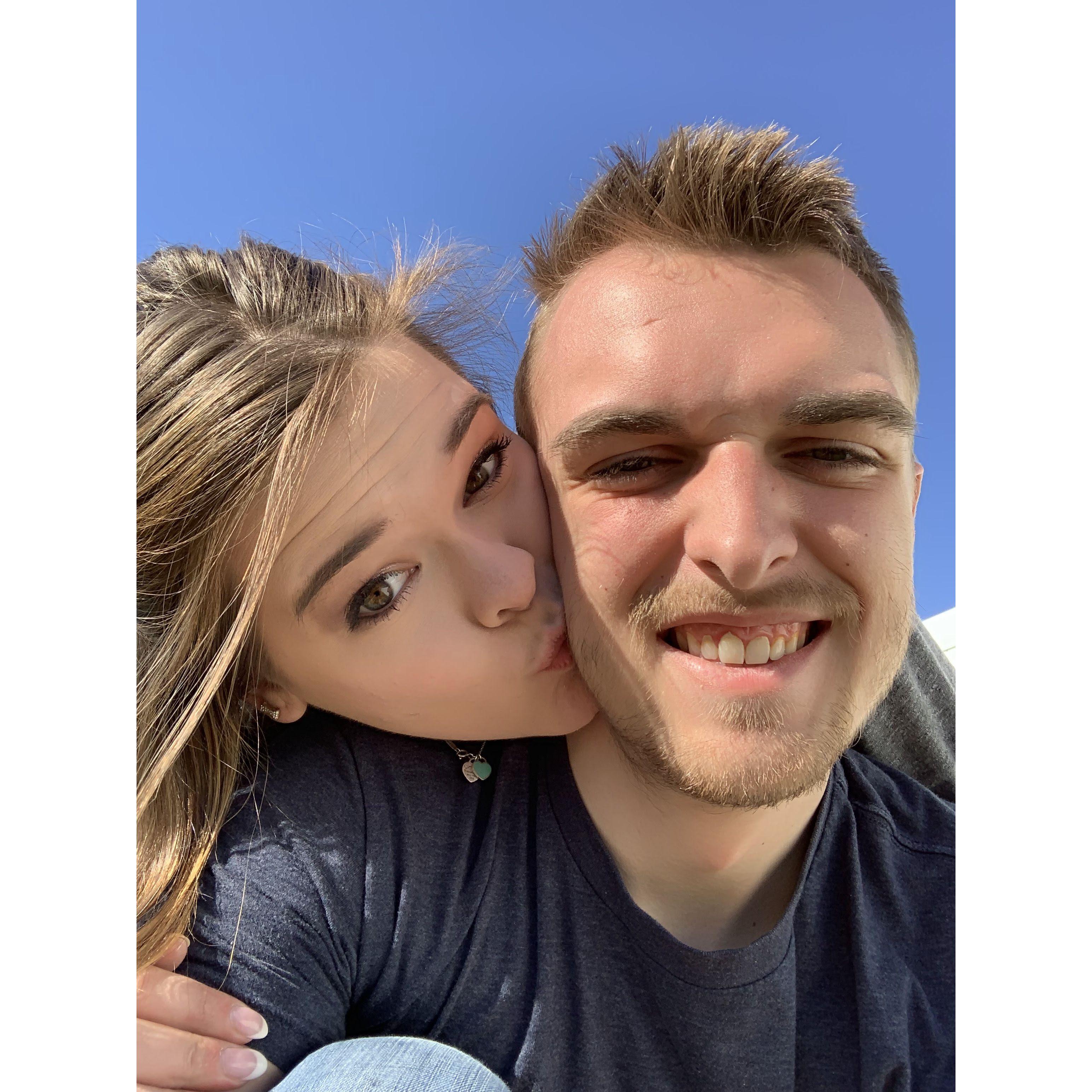 One of my favorite pictures of us sitting in my parents backyard