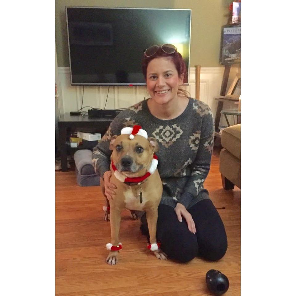 Sara and their "fur baby", Tiffany aka Princess Buttercup aka PBCito aka schnoodle muffin head aka Bubba Gump. The true princess of our house!