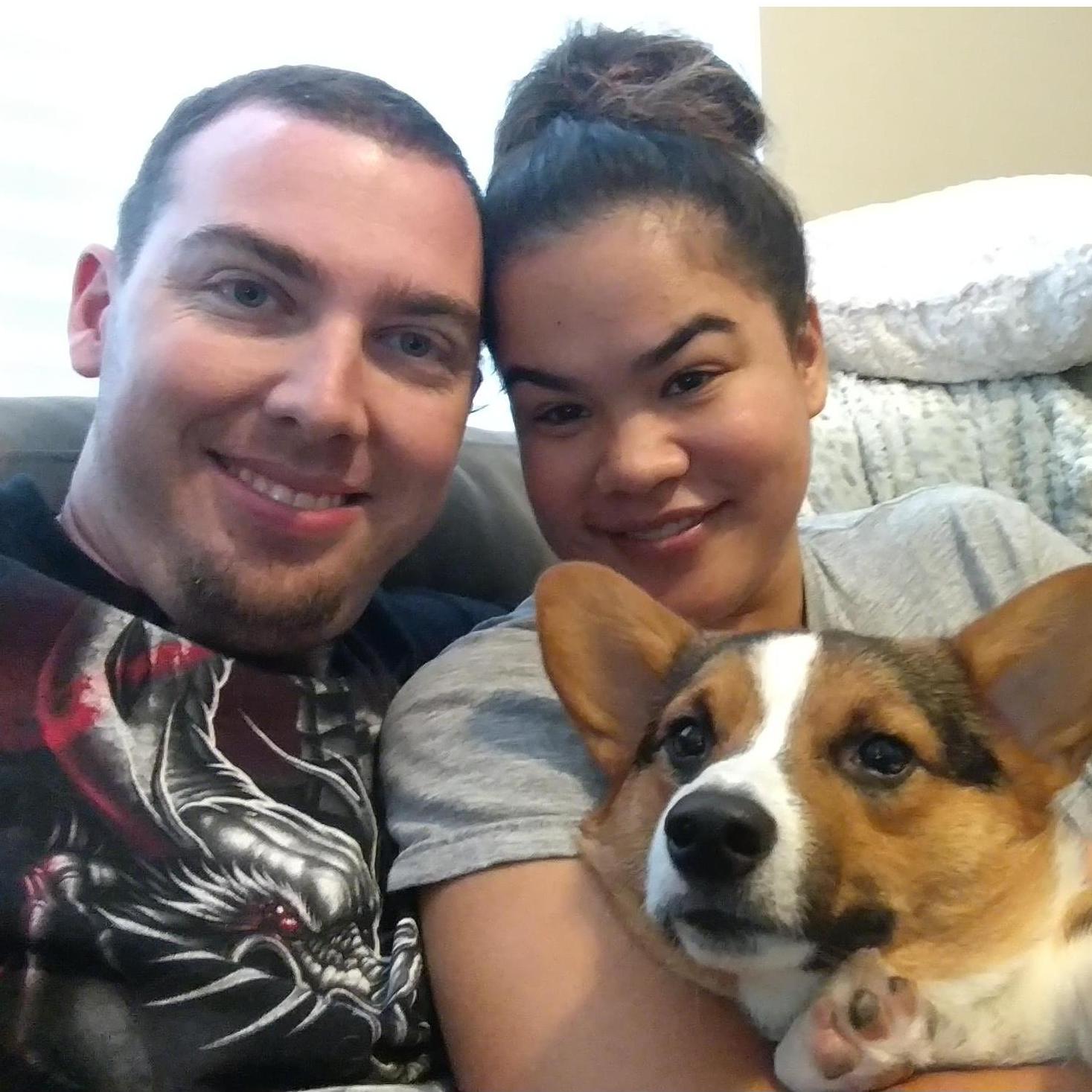 One of our first pictures with Momo when we first started dating. Momo is displeased.