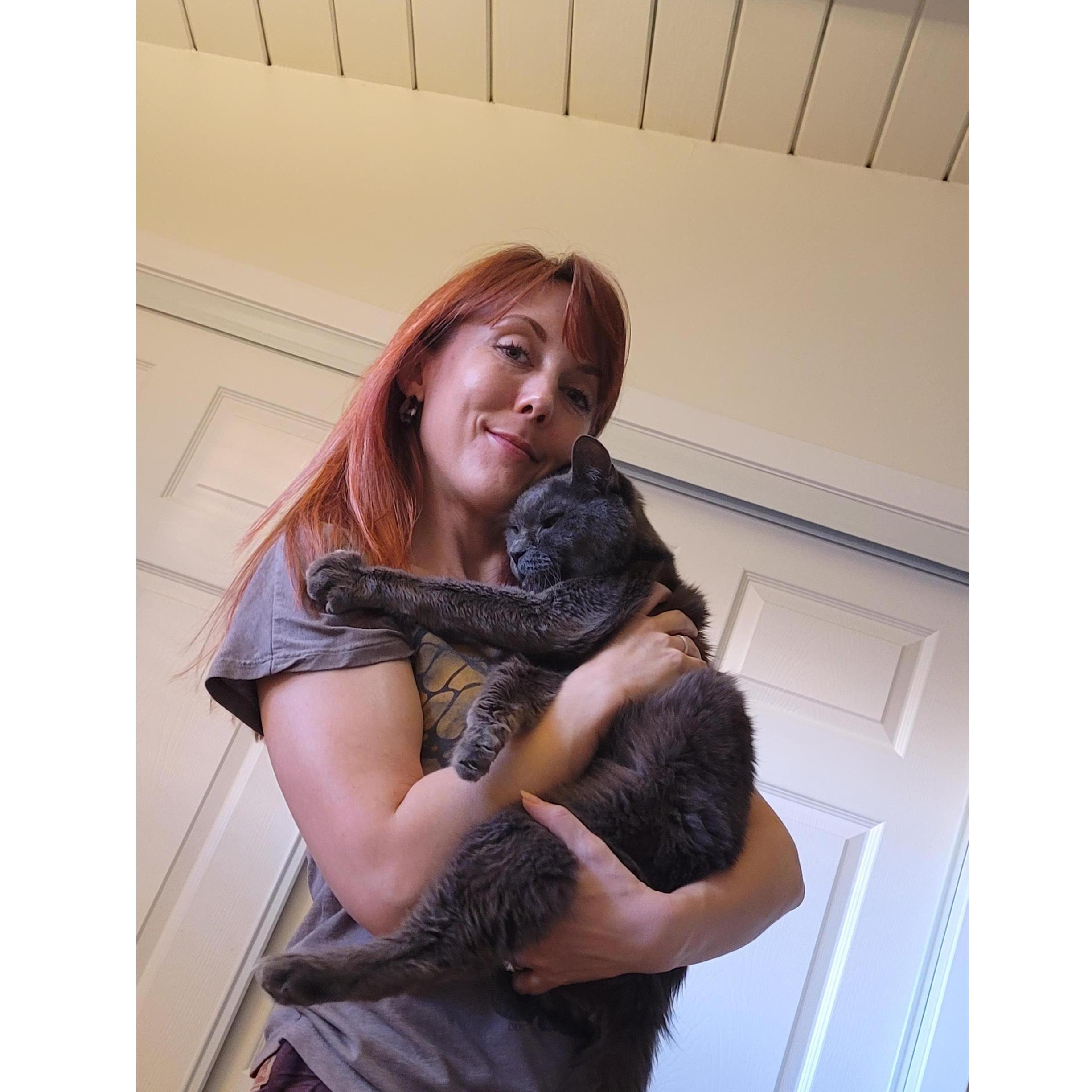 Erin and Jayk's beloved Sooty hugging at our new spot in Altadena