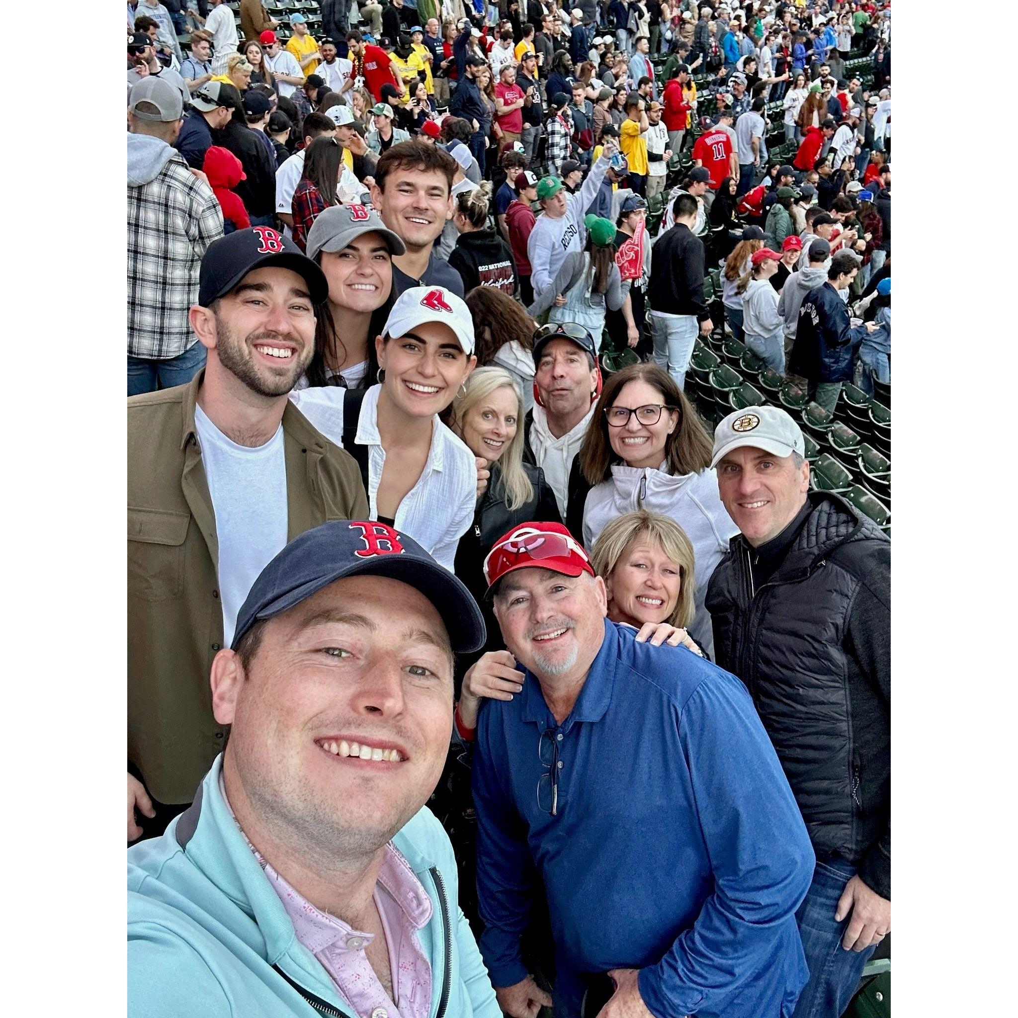 Ben surprised Julia with our family in Boston after our engagement & we went to a Red Sox game