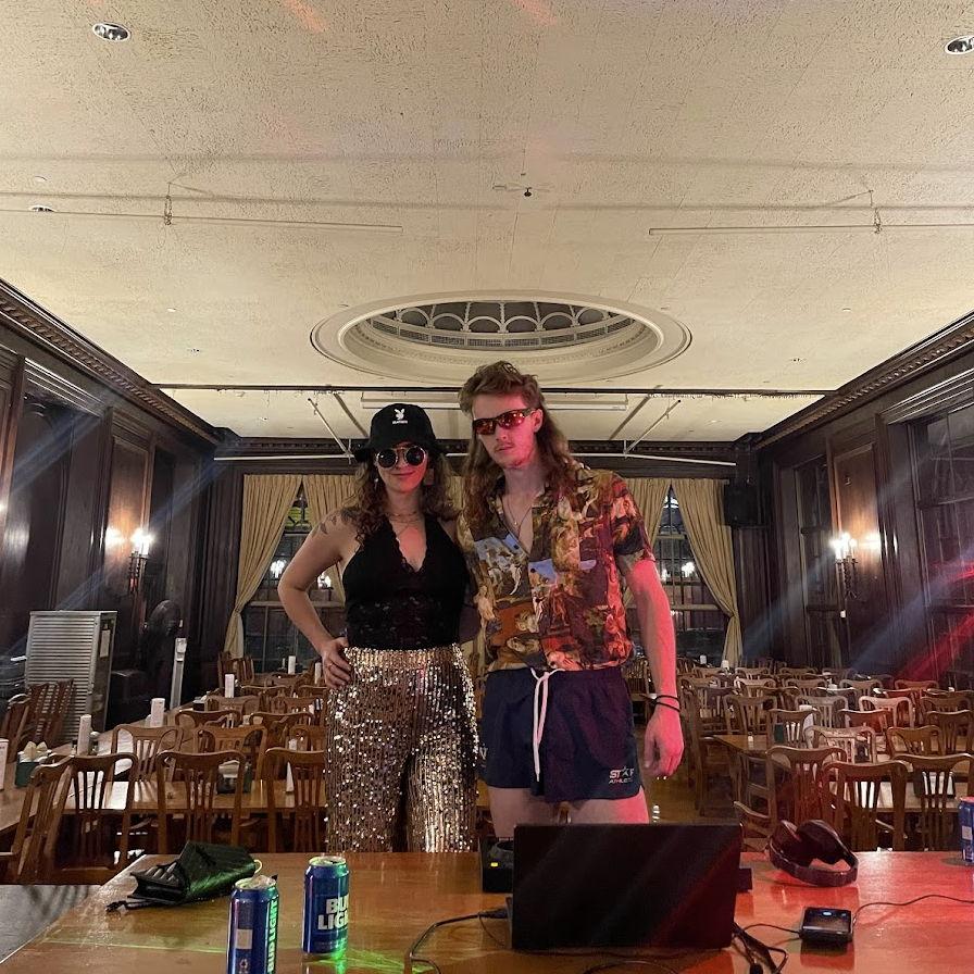 Kyle getting set to DJ an event at Adams House at Harvard, 2022