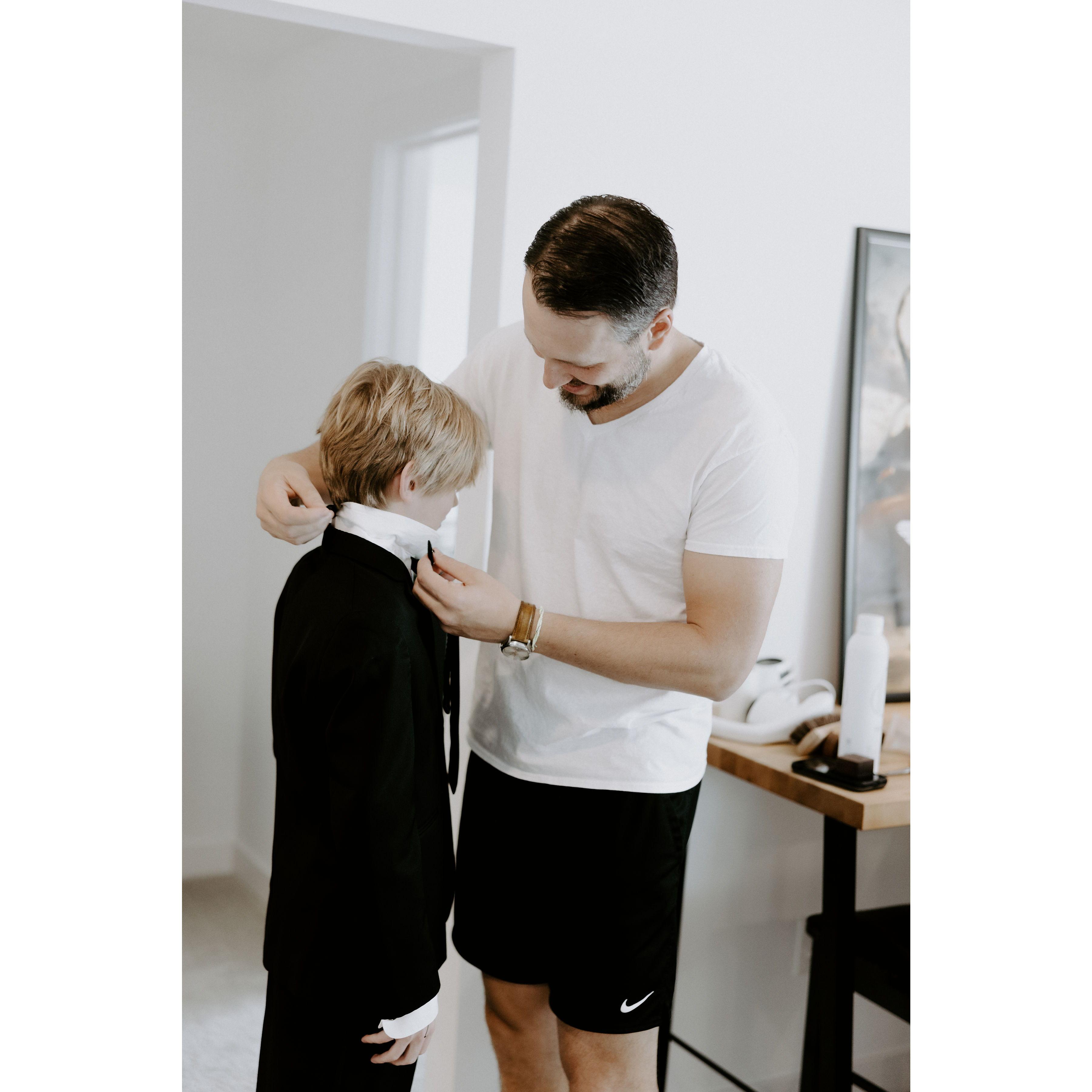 Aaron helping Reid get ready