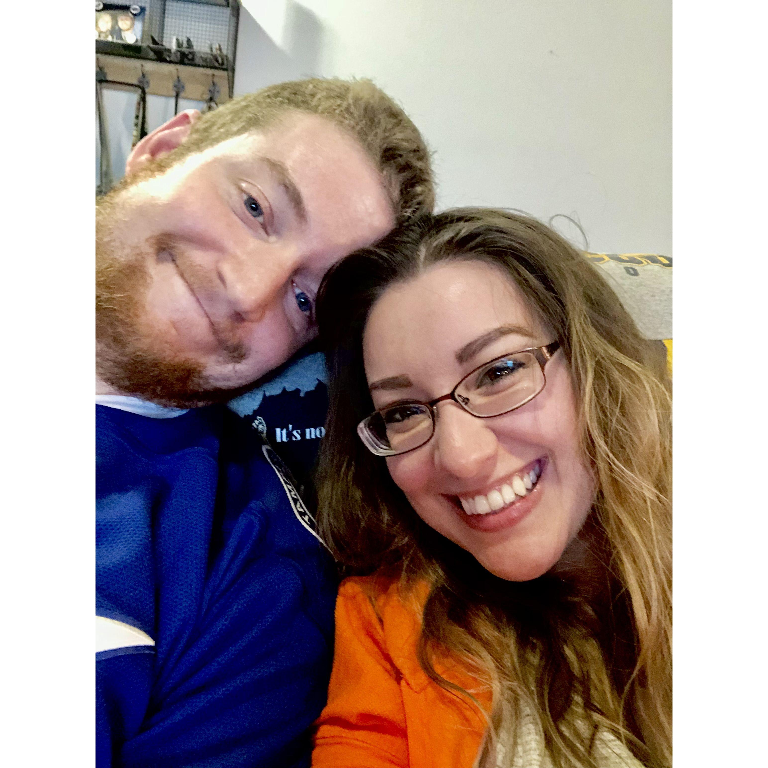 Watching the Lightning play at Joel and Caitlin's house.