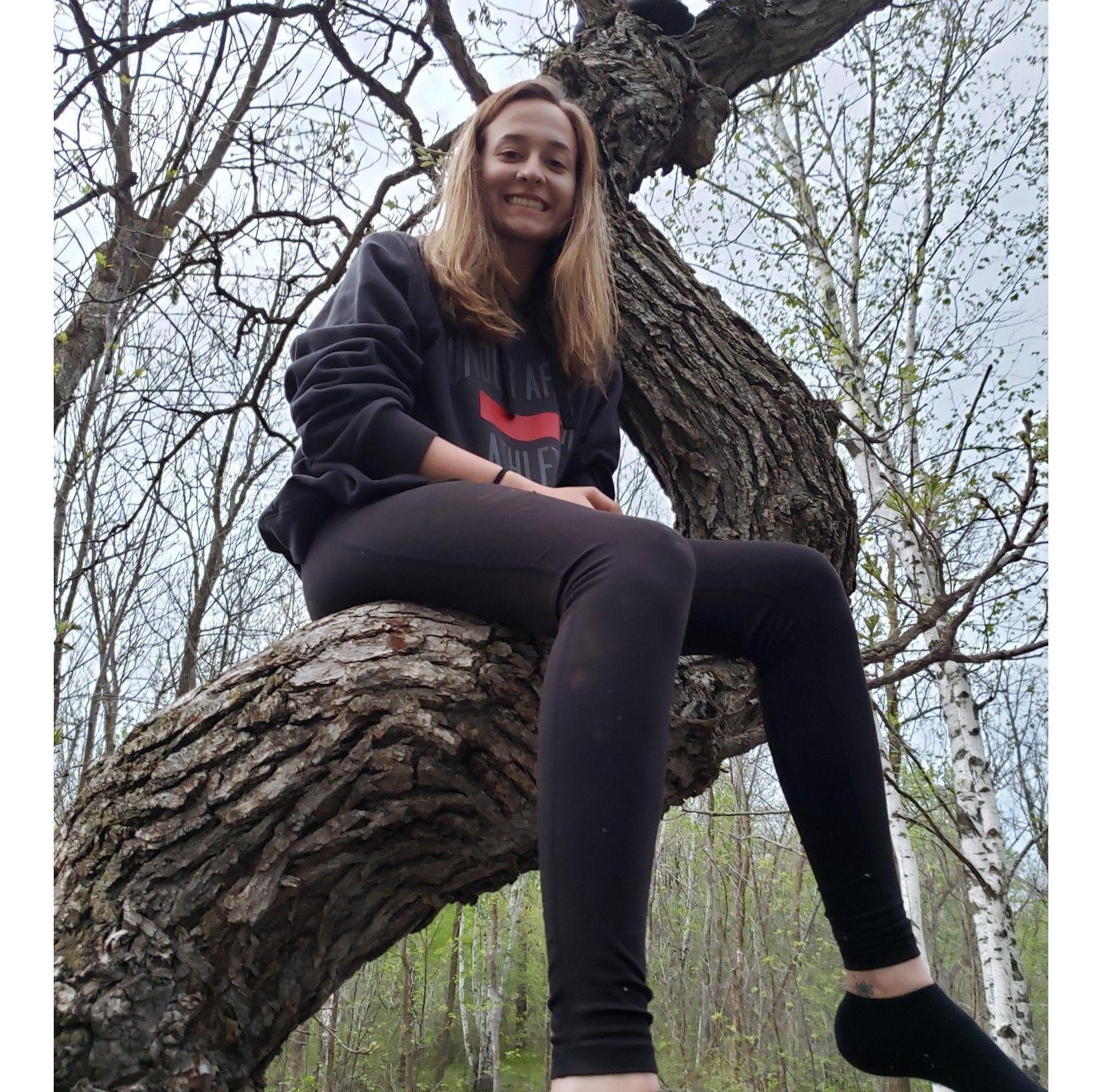 Lexie’s first time at Alex’s family’s annual Memorial Day weekend. There is a Crooked Tree on their property and everyone has to get a picture in it when they visit. May 2019.