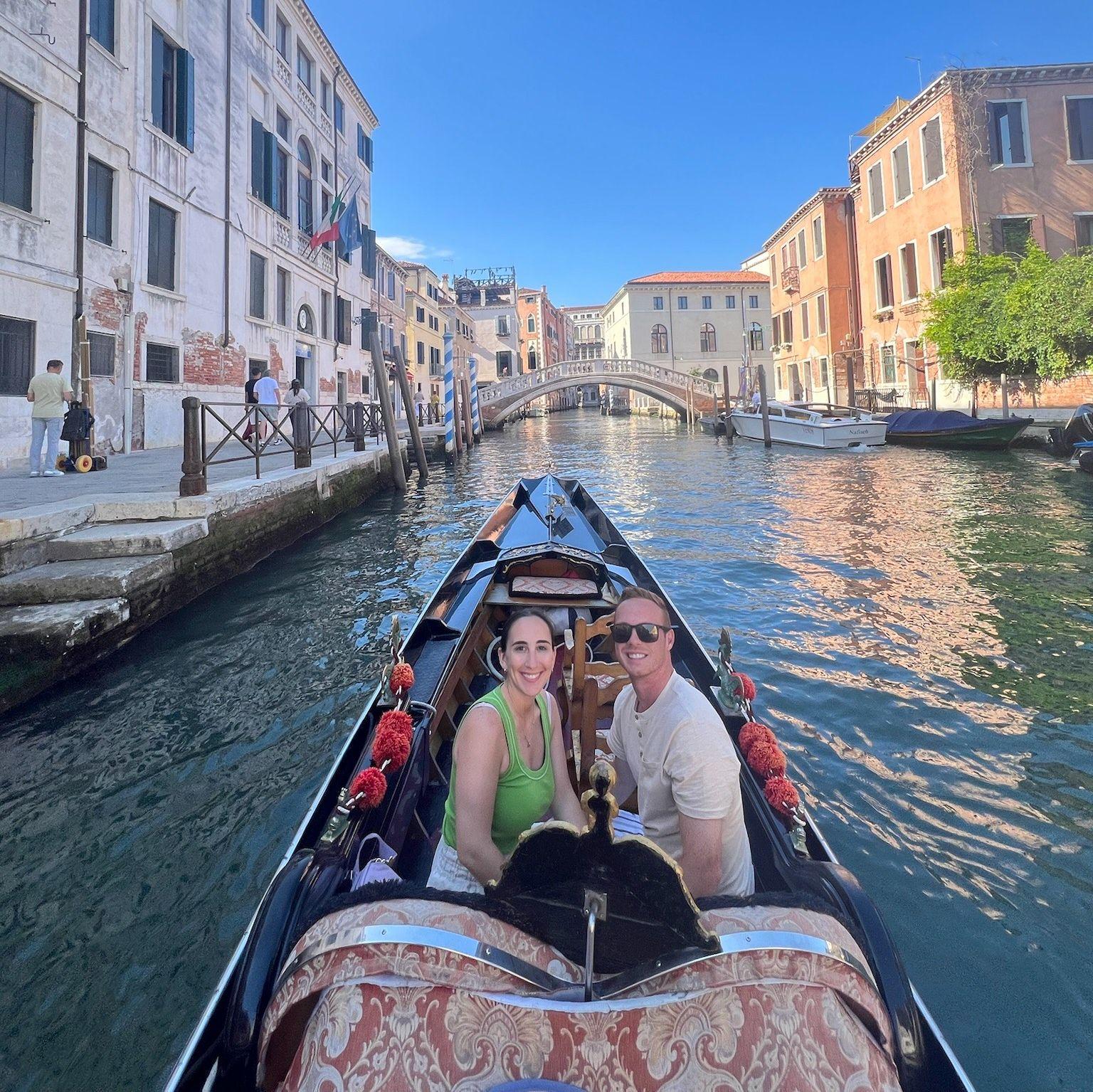 Enjoying the gondola in Venice.