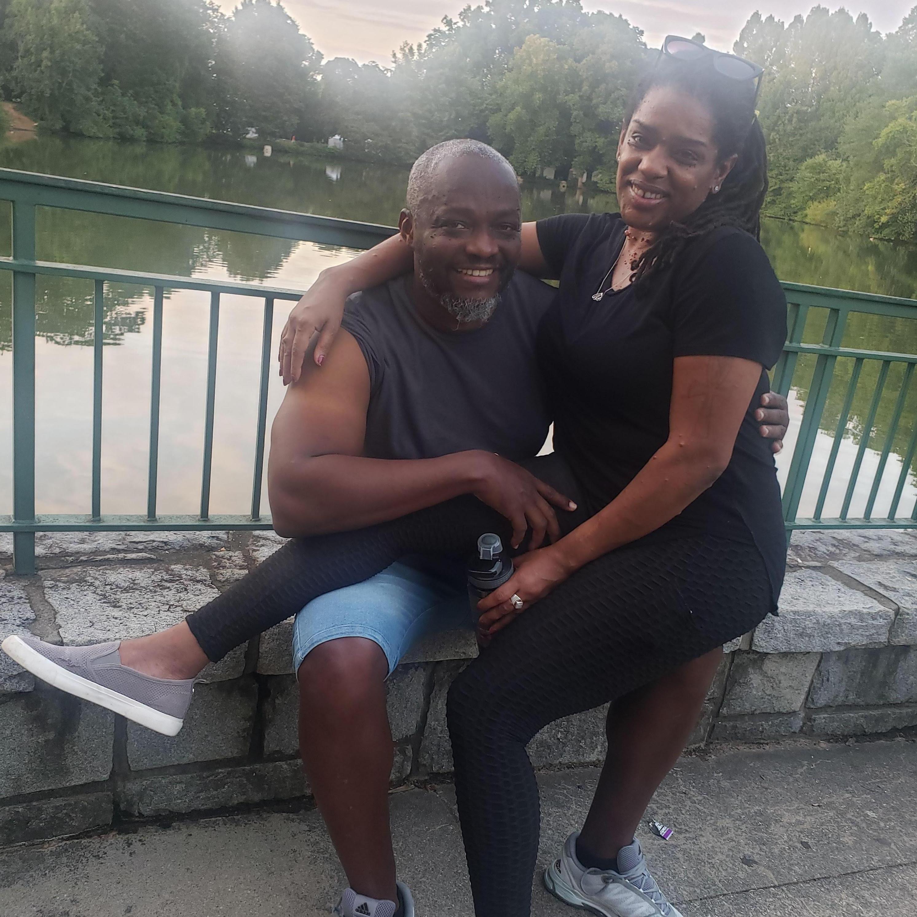 Strolling Piedmont Park when a stranger insisted that he capture this moment in time for us.