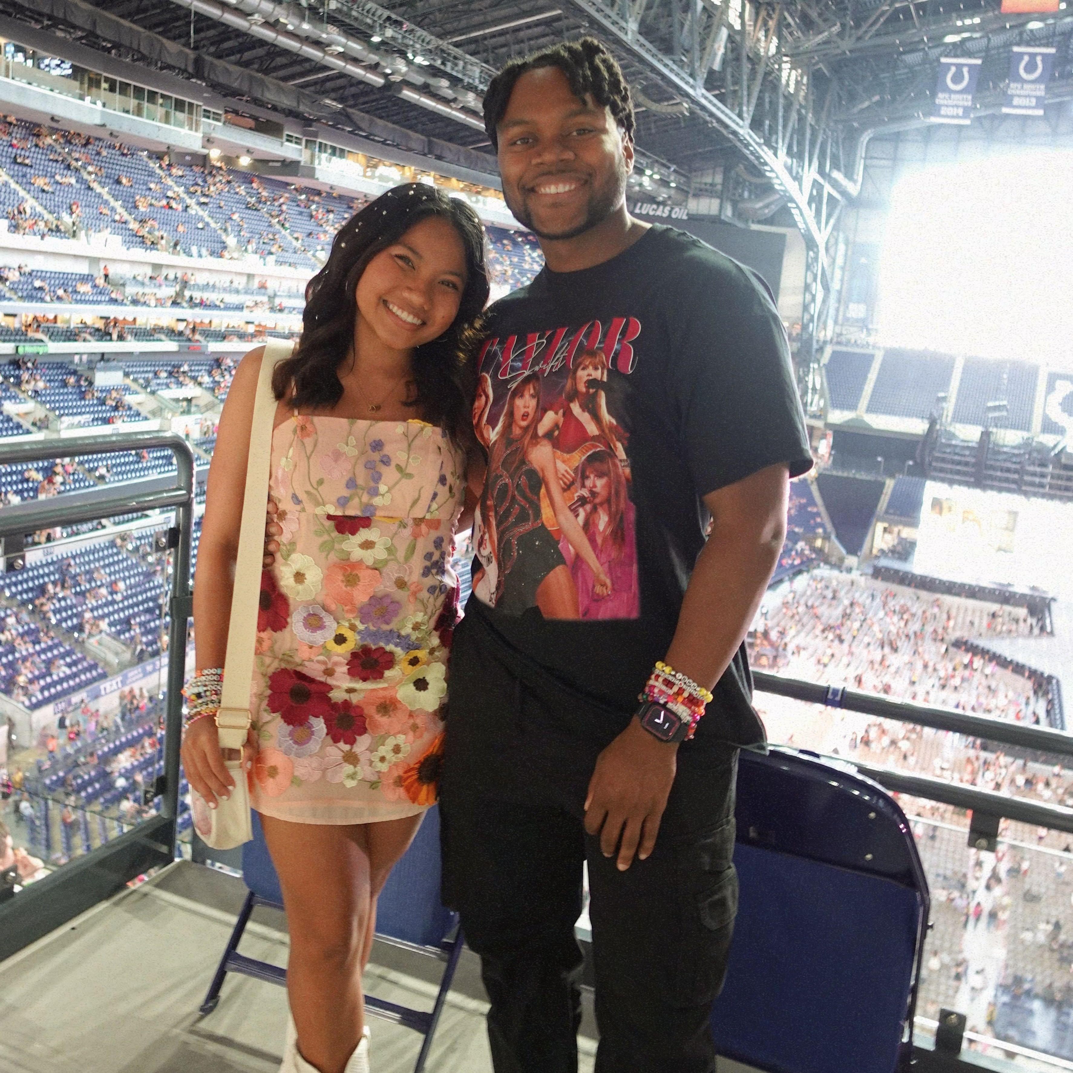 At the Taylor Swift Eras Tour Concert... in Indy! Yes WE are Swifties.