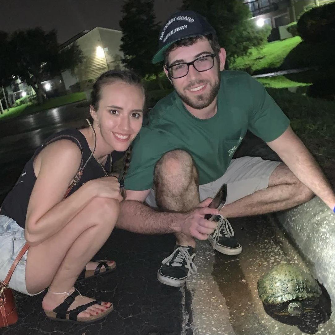 2020. Sarah's brother, David, took this photo during their late night walk in St. Petersburg just after Sarah graduated with her master's in neuroscience at USF.