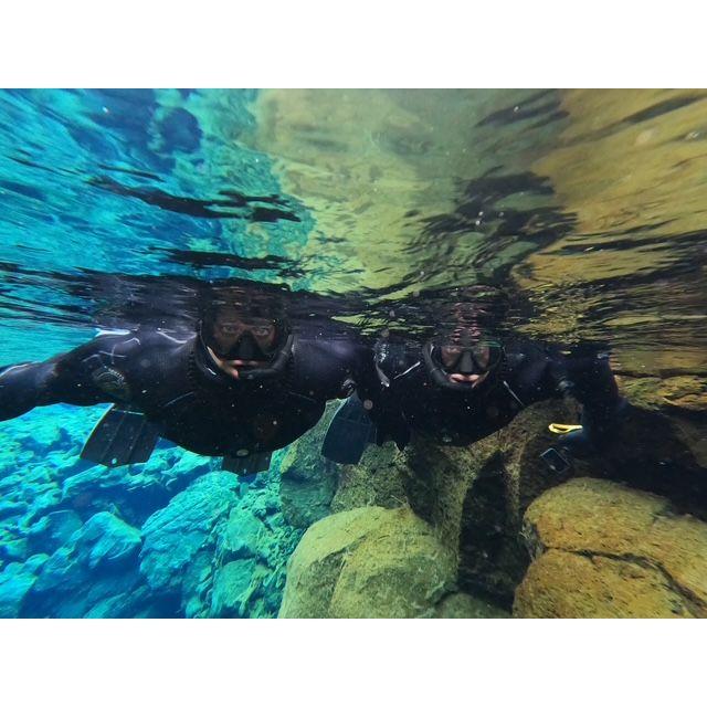 Snorkeling in the Silfra fissure between two tectonic plates, Iceland